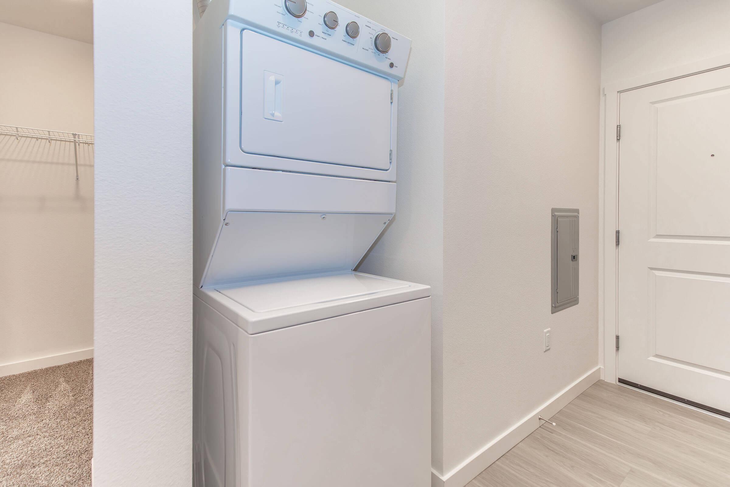 a kitchen with a sink and a refrigerator