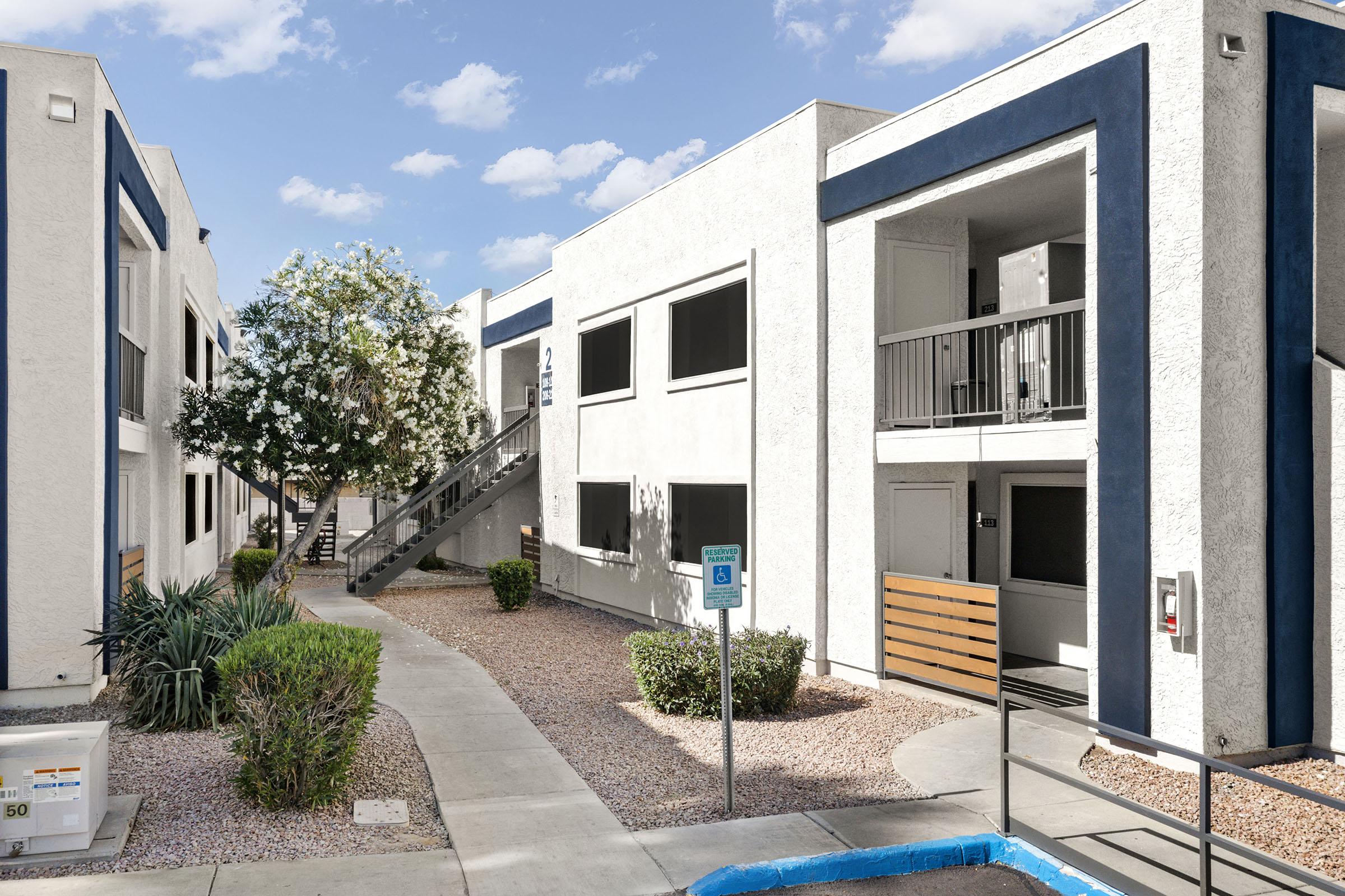 Apartment buildings and community walkways.