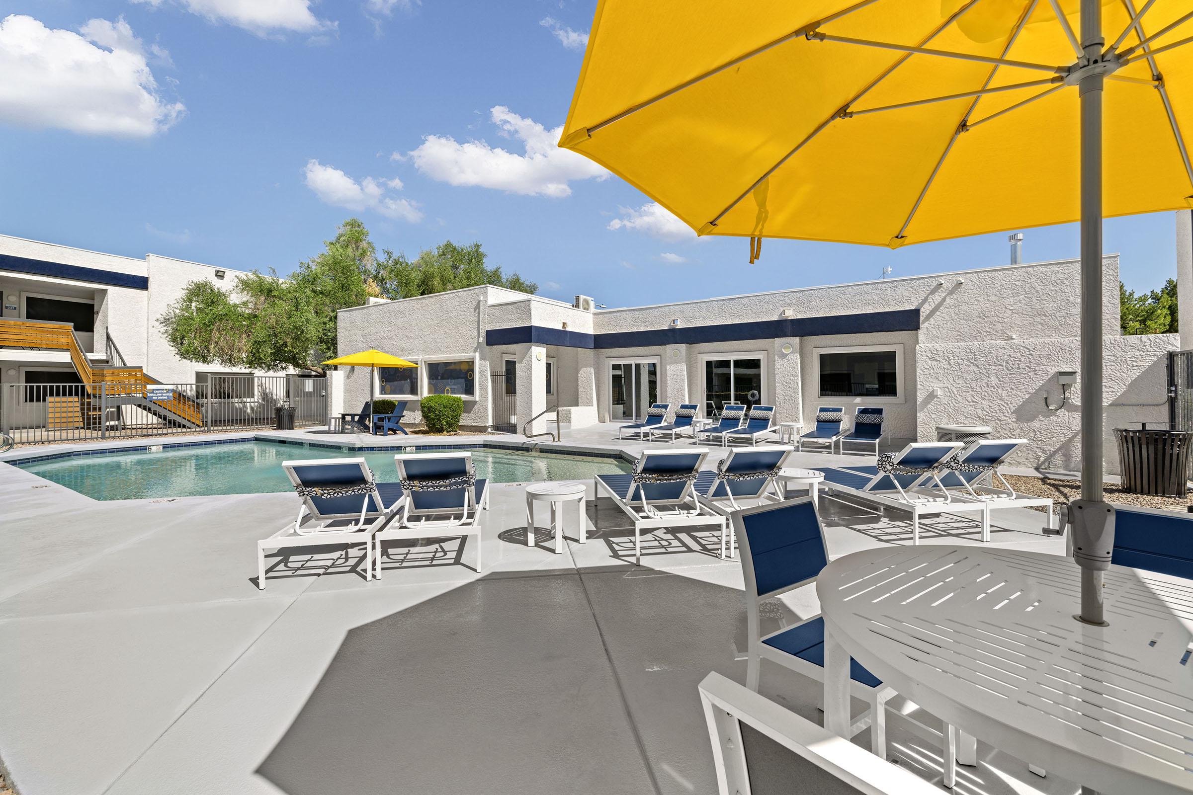 Swimming pool and pool-deck seating.