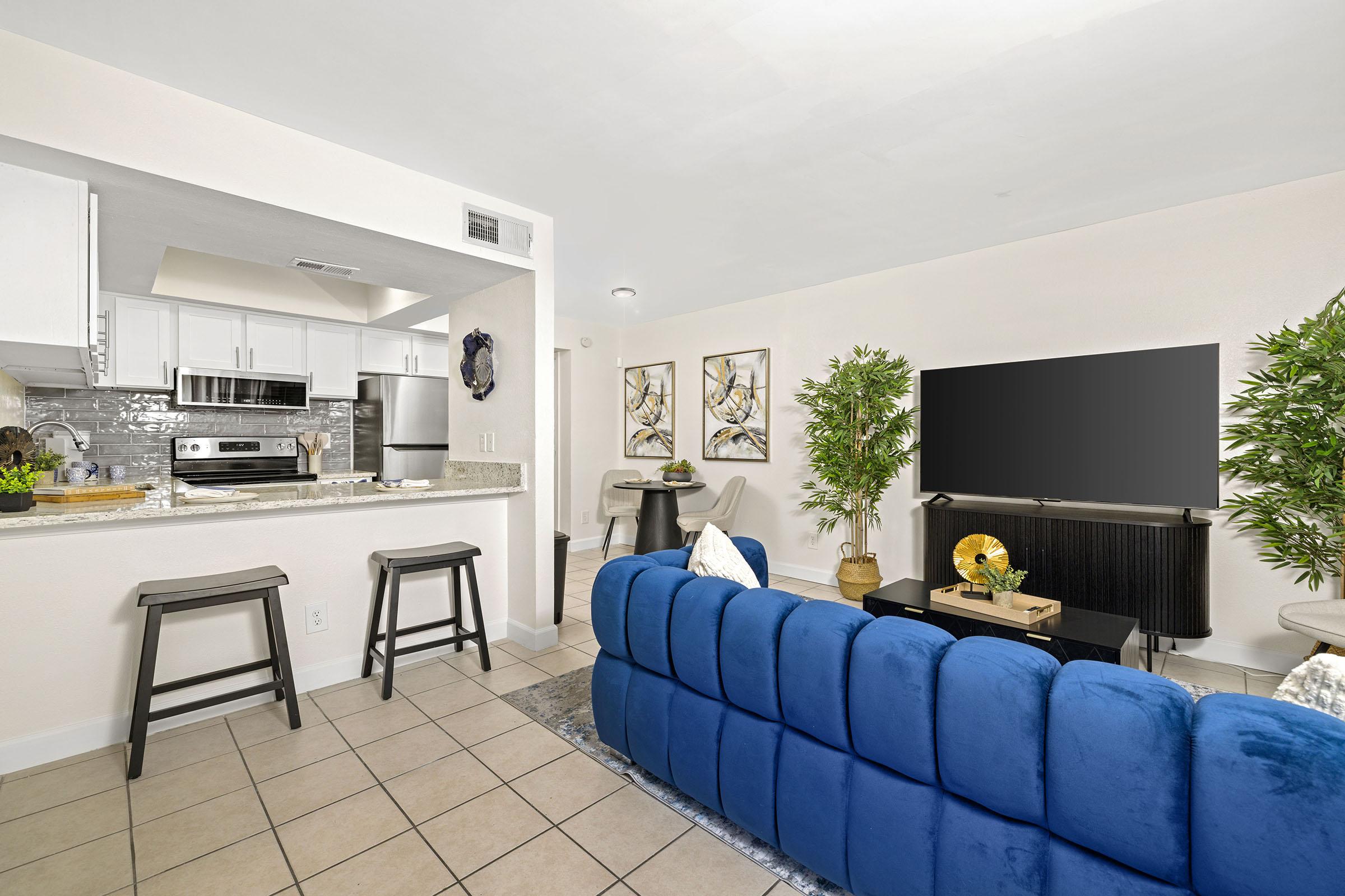 Furnished model apartment living room.
