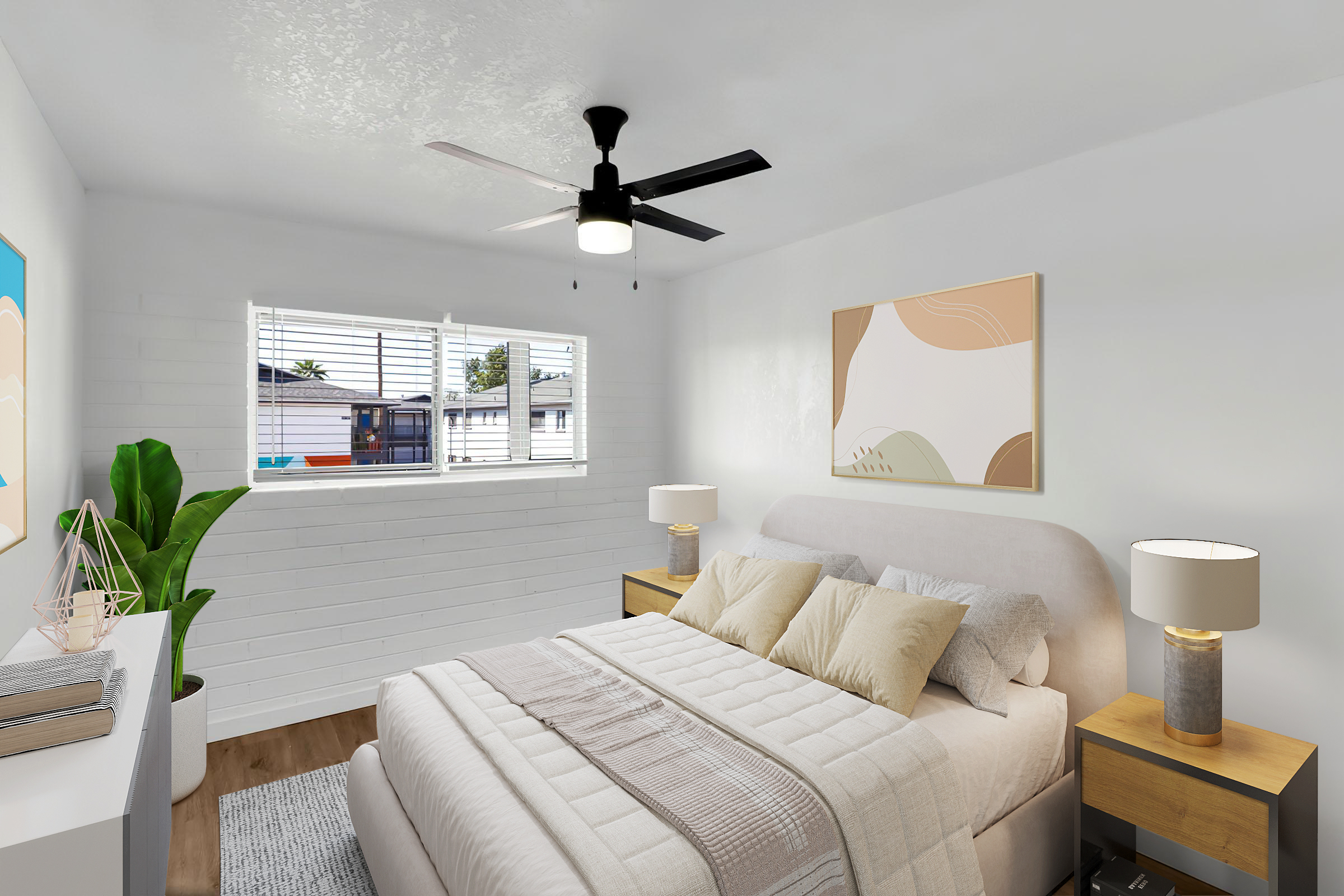 A cozy bedroom featuring a light-colored bed with plush pillows, two bedside tables with lamps, and a ceiling fan. A large window provides natural light, and a green plant adds a touch of nature. Decorative artwork hangs on the wall, complementing the modern and inviting aesthetic.