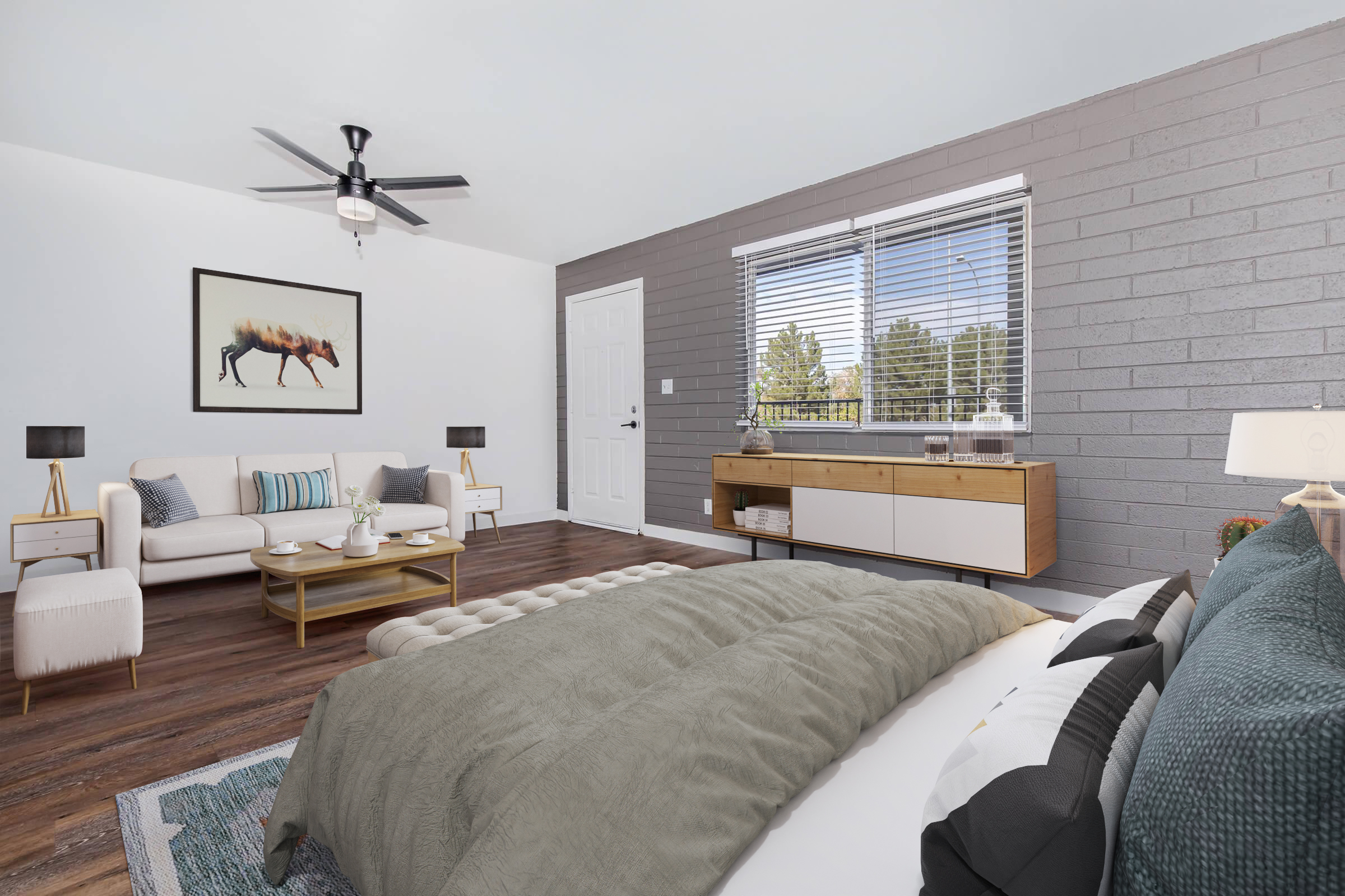 A modern bedroom featuring a large bed with a light gray blanket, stylish armchairs, and a wooden dresser. A painting of a horse hangs on the wall, and large windows let in natural light, complementing the warm wood flooring and contemporary decor.