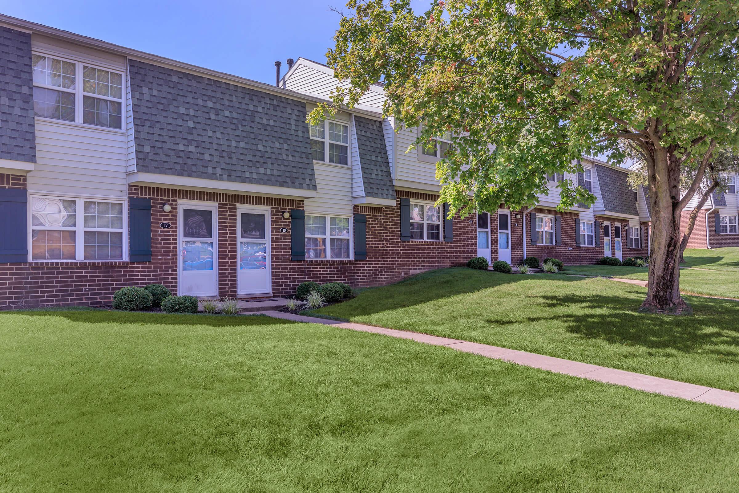 a large lawn in front of a house