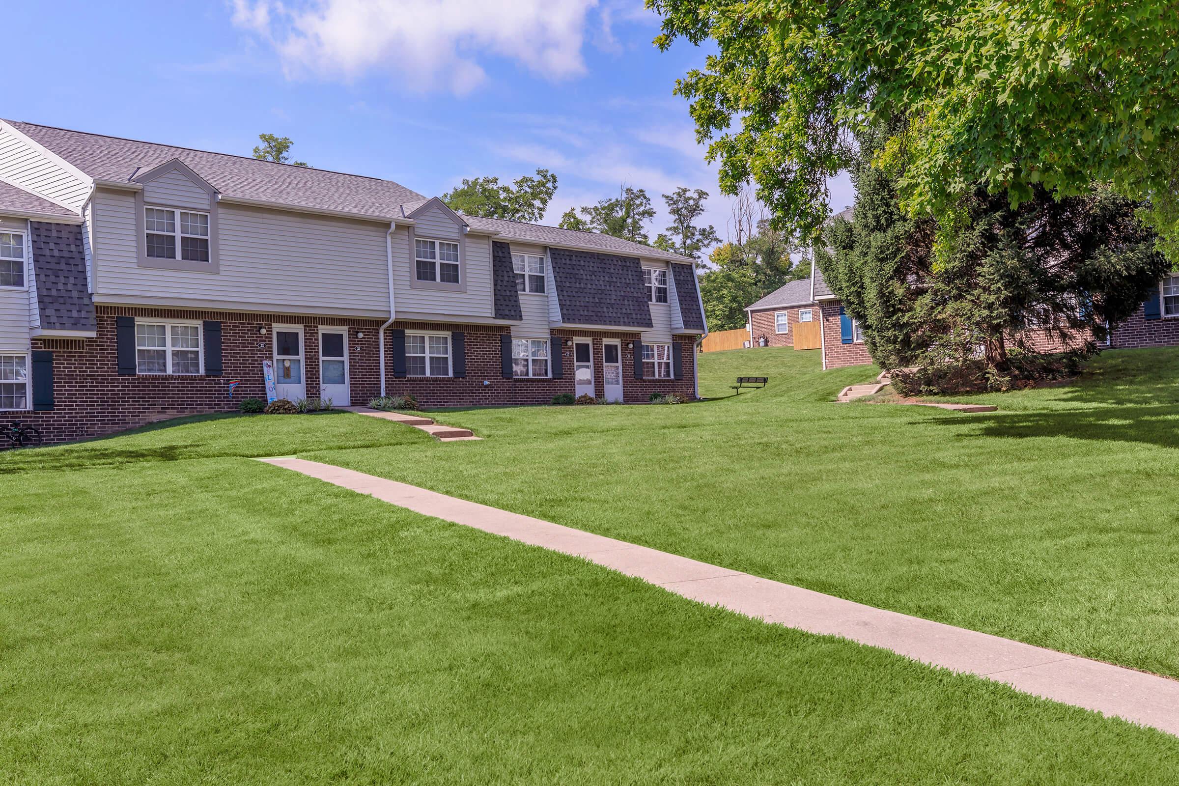 a large lawn in front of a house