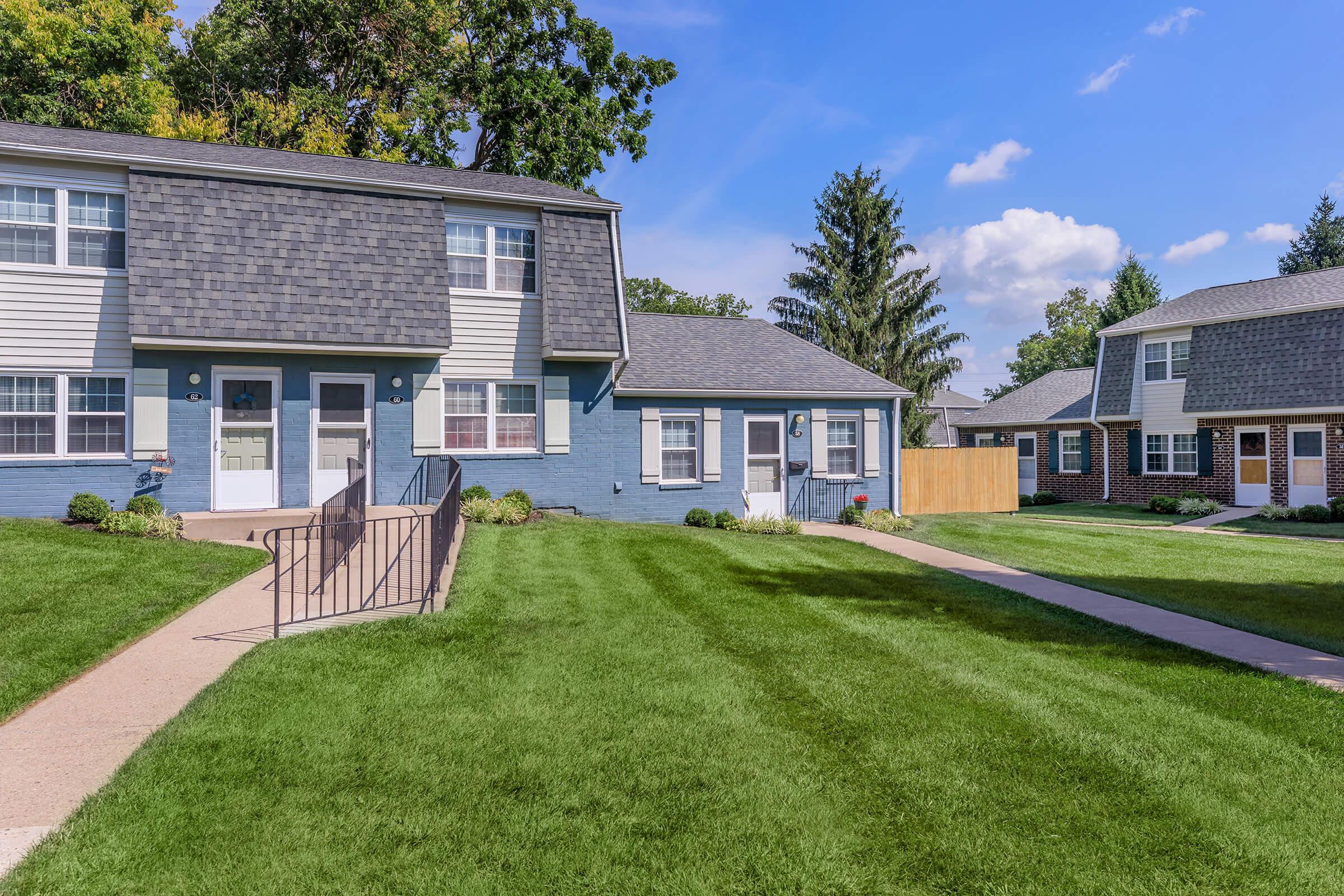 a large lawn in front of a house