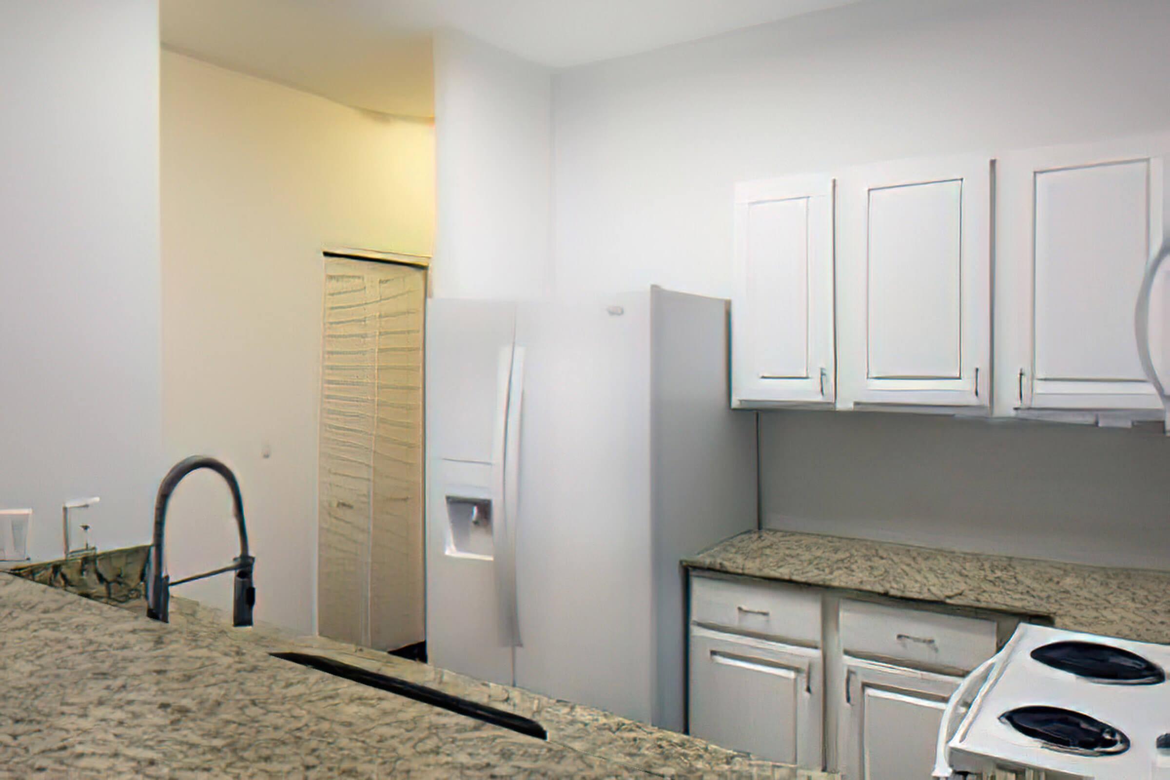 a kitchen with a sink and a microwave