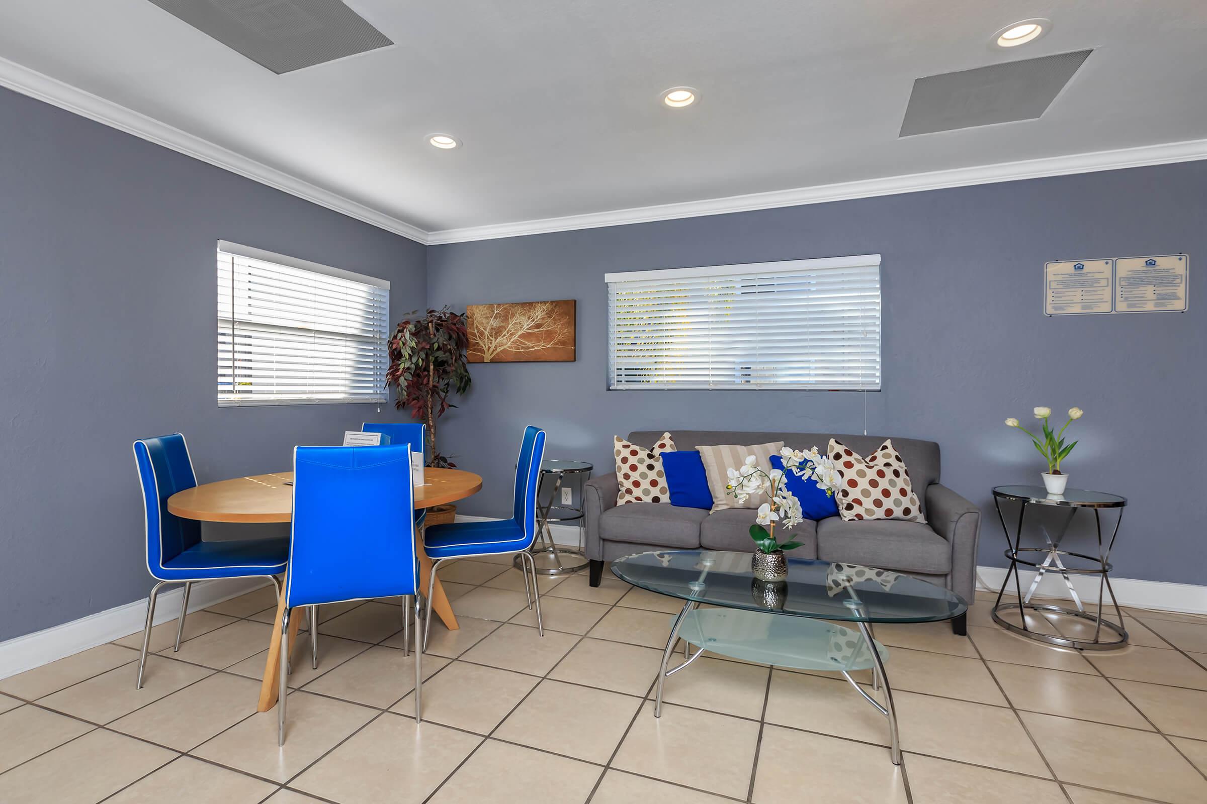 a blue chair in a room