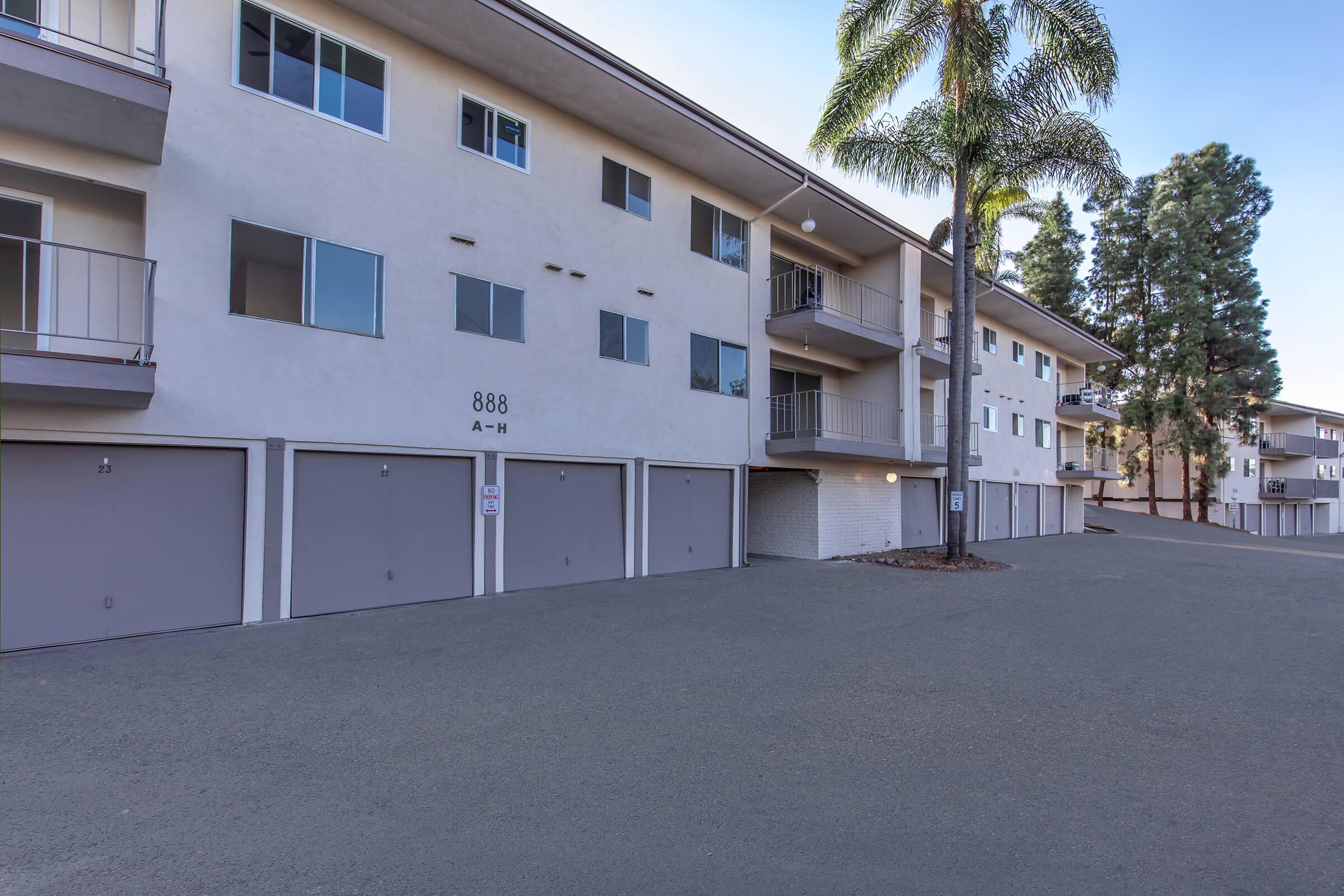 a small house in a parking lot