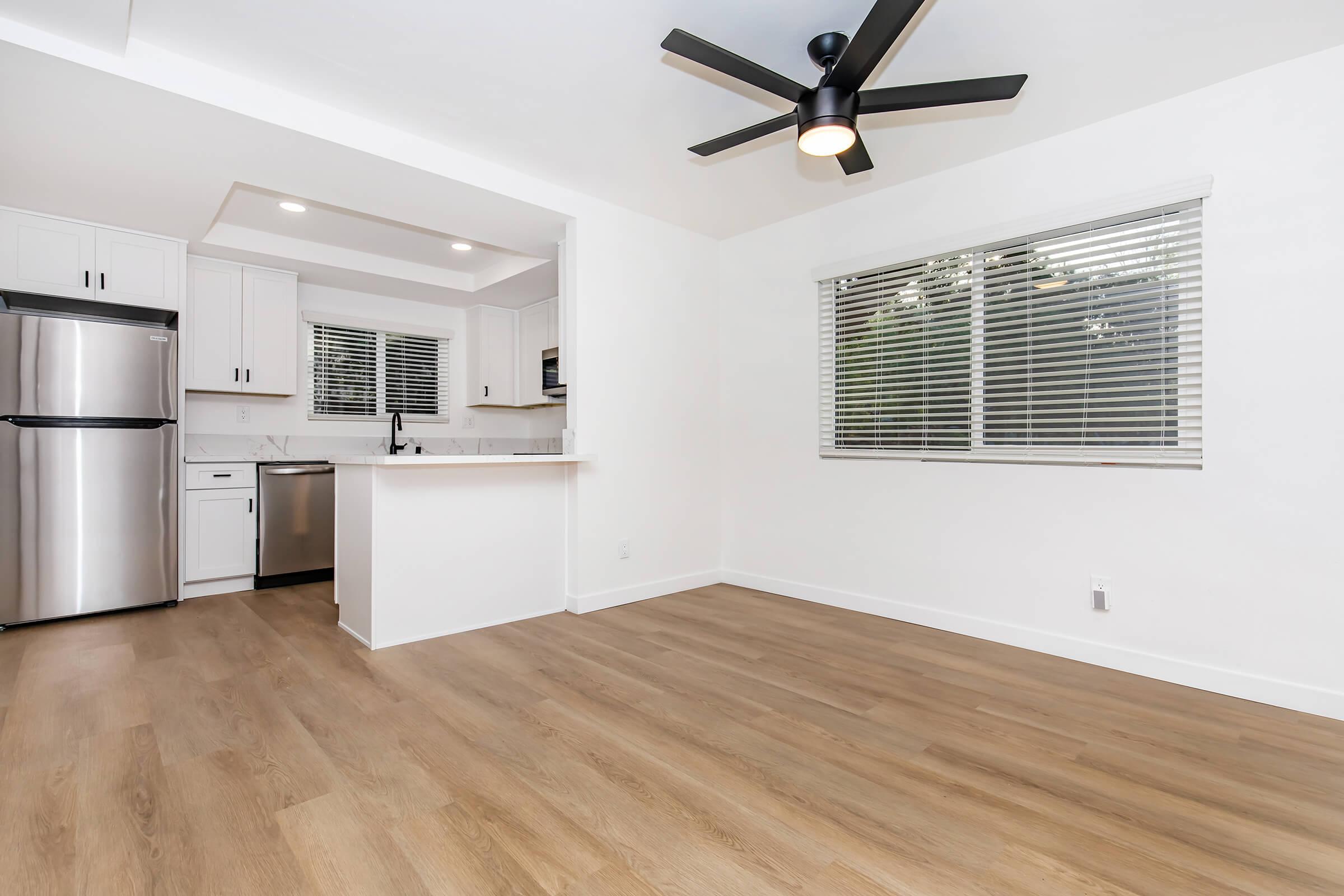 a kitchen with a wood floor