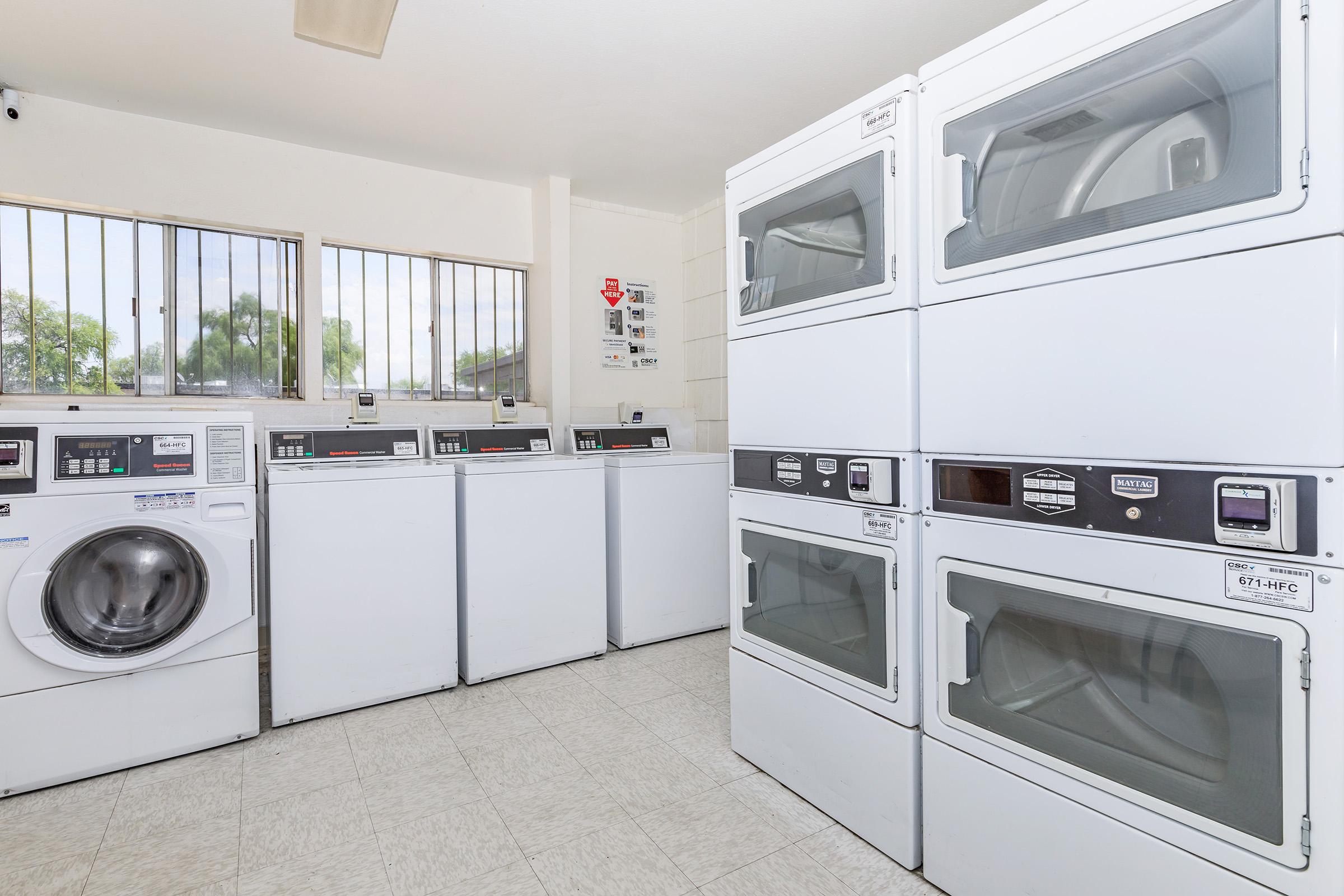 a stove top oven sitting inside of a kitchen