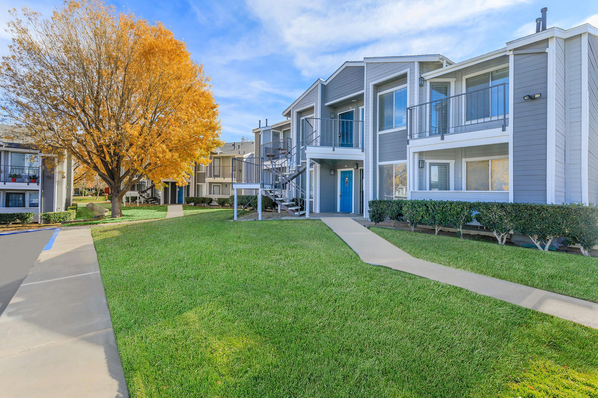 a large lawn in front of a building