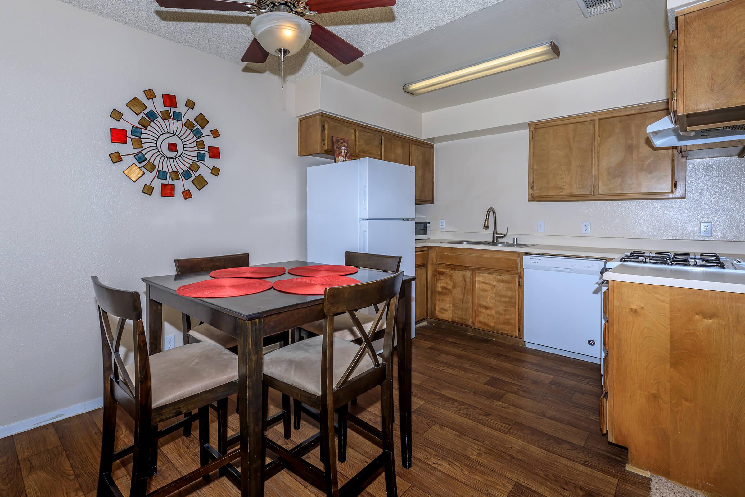 a kitchen with a dining room table