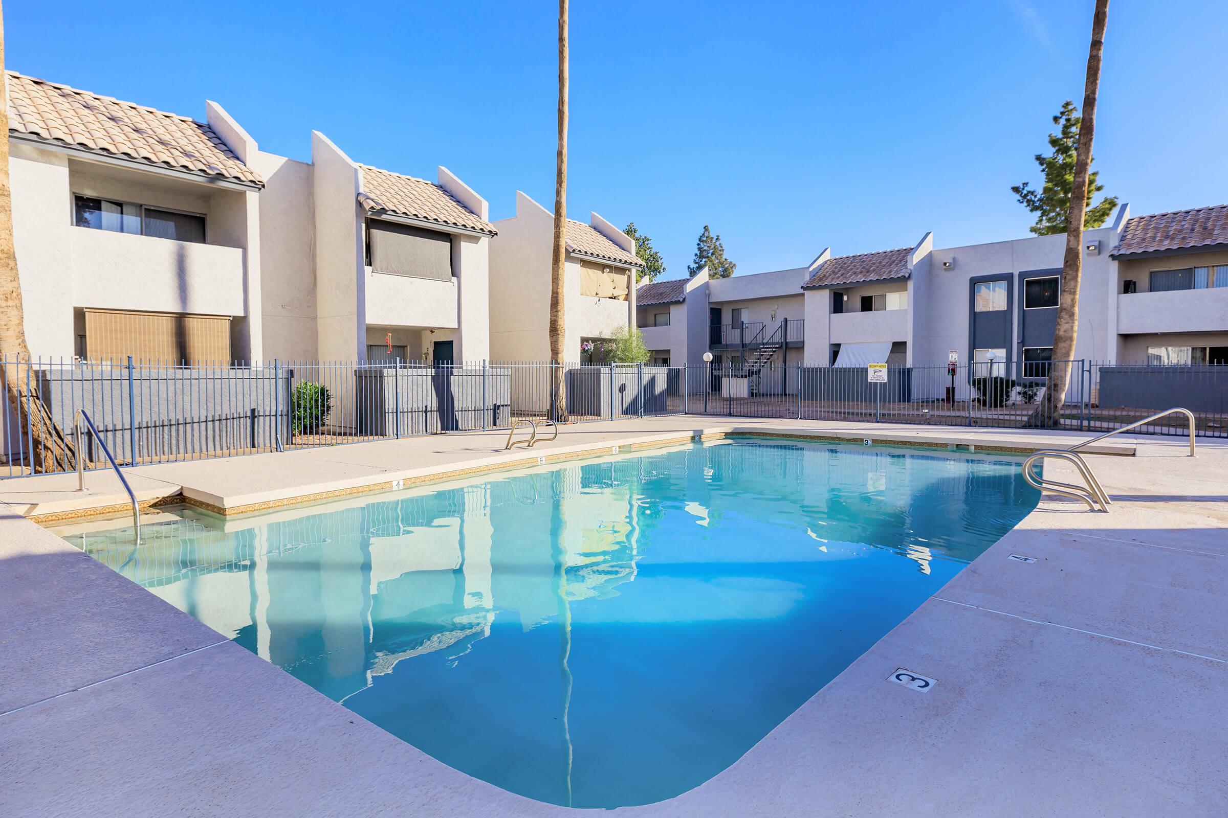 a large pool of water in front of a building