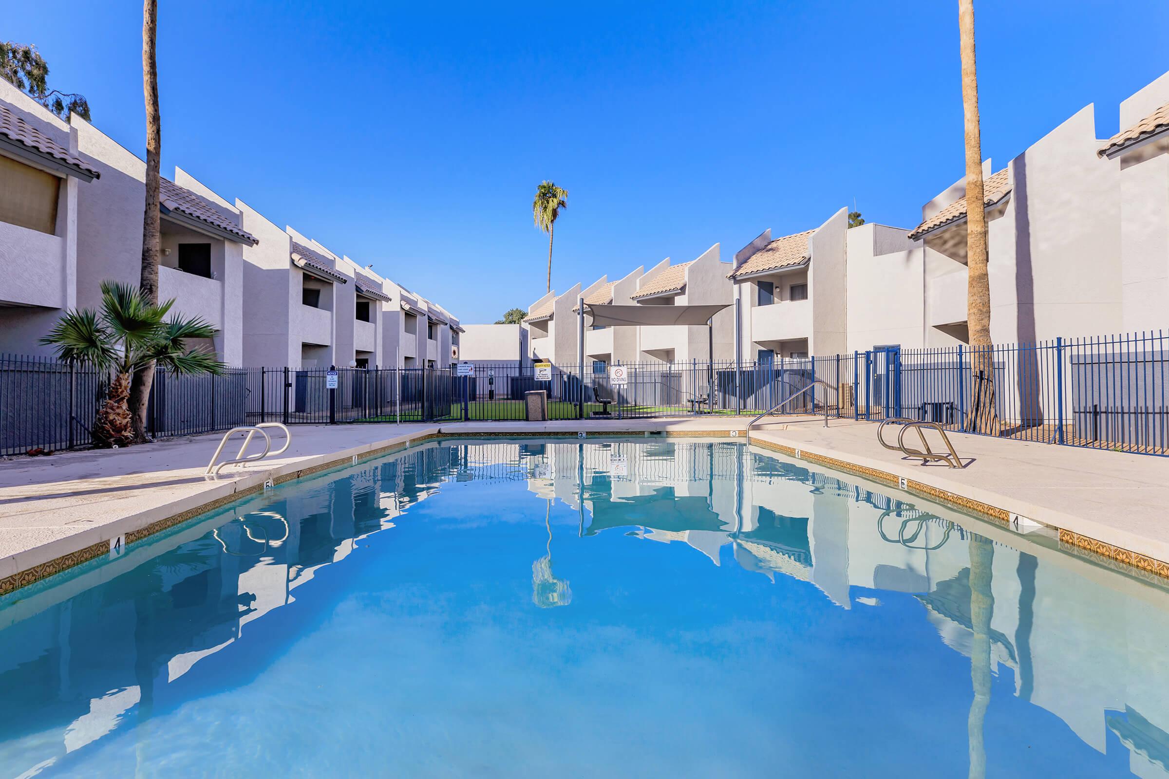 a large pool of water in front of a building