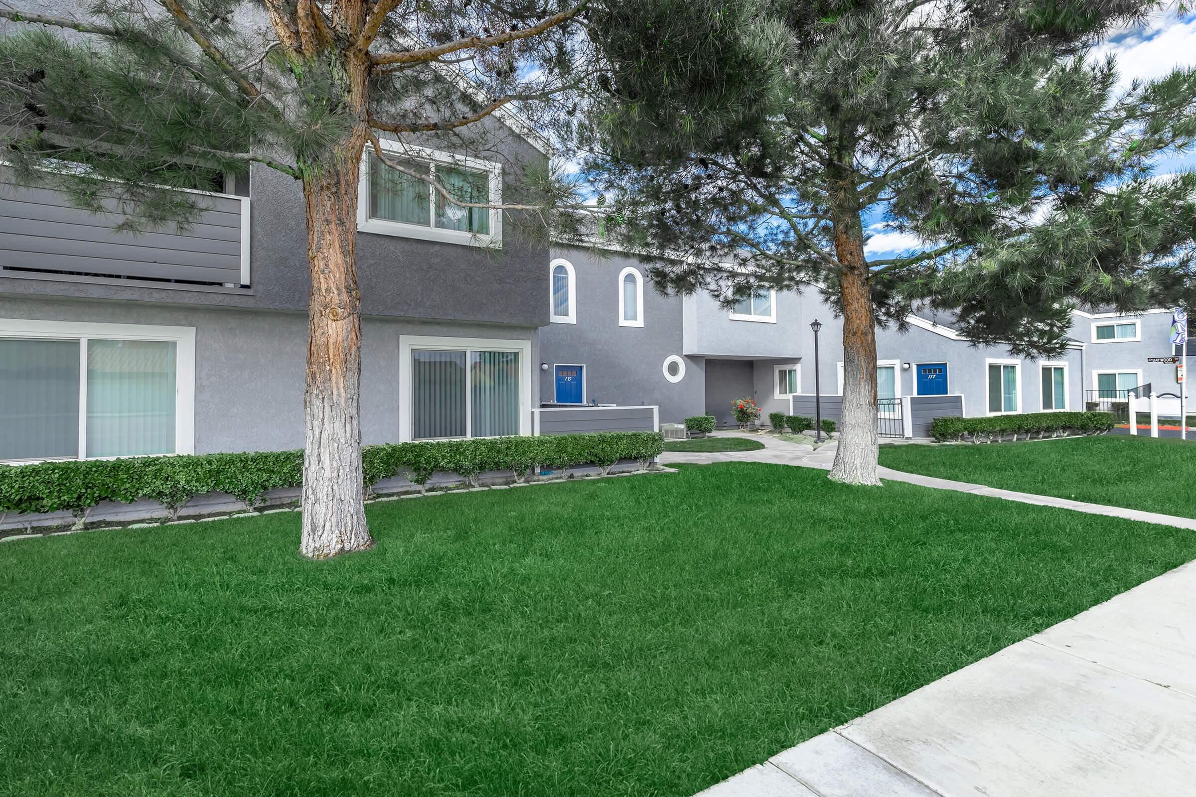 a large lawn in front of a house