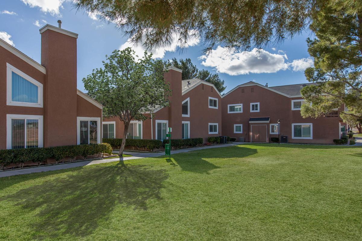 a large lawn in front of a house