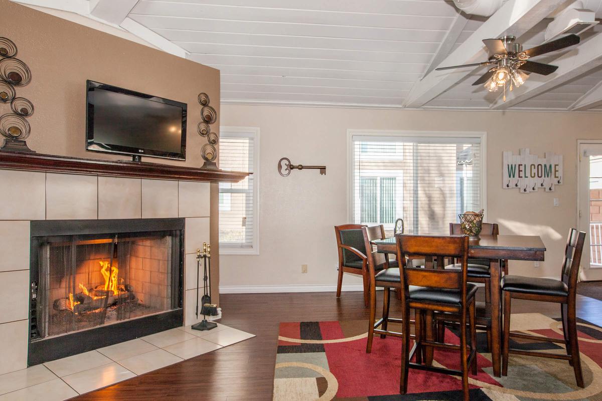 a fire place sitting in a living room with a fireplace