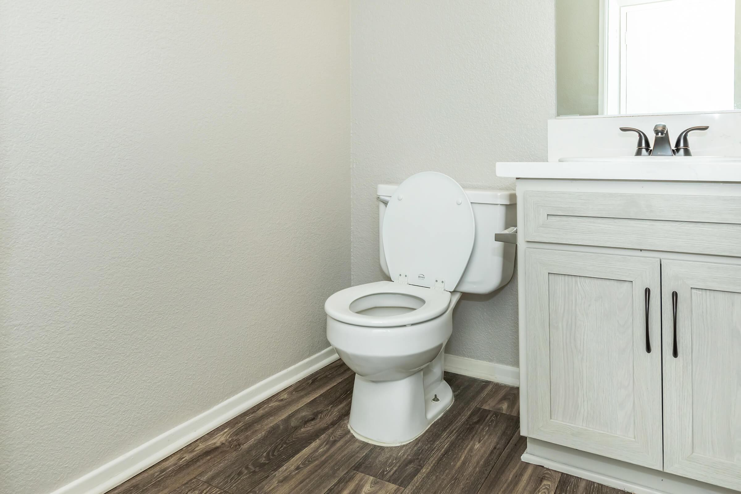 a close up of a sink in a small room