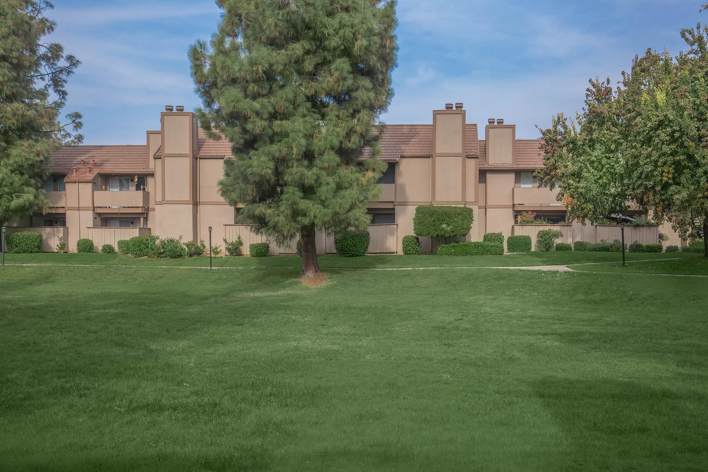 a large lawn in front of a building