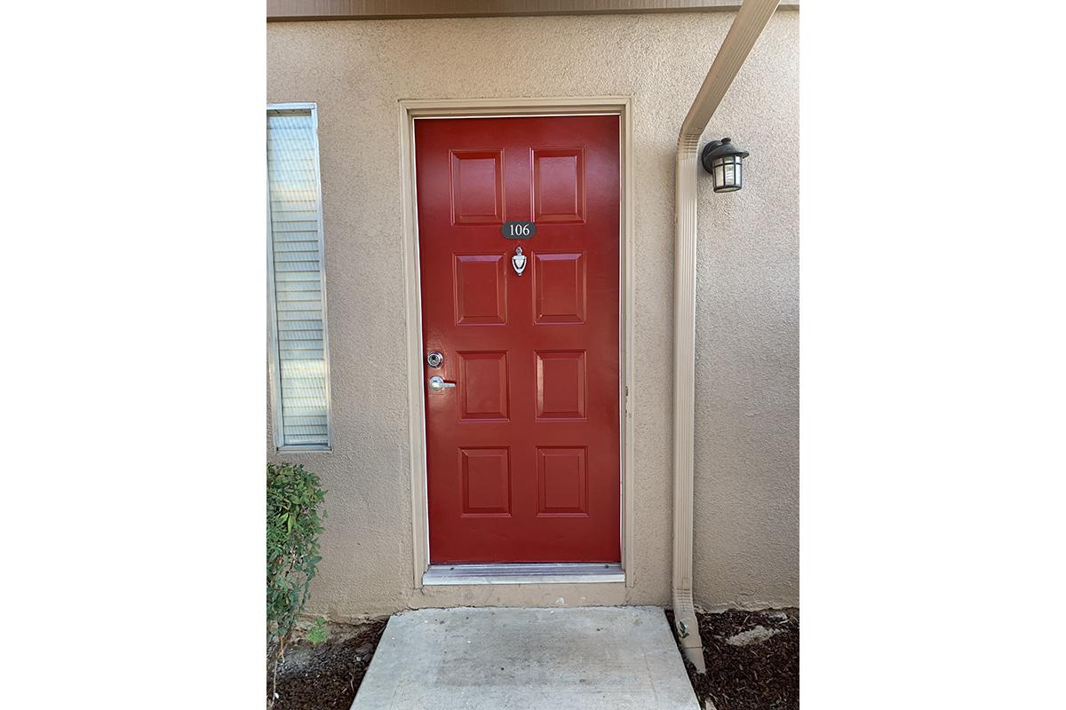 a close up of a red door