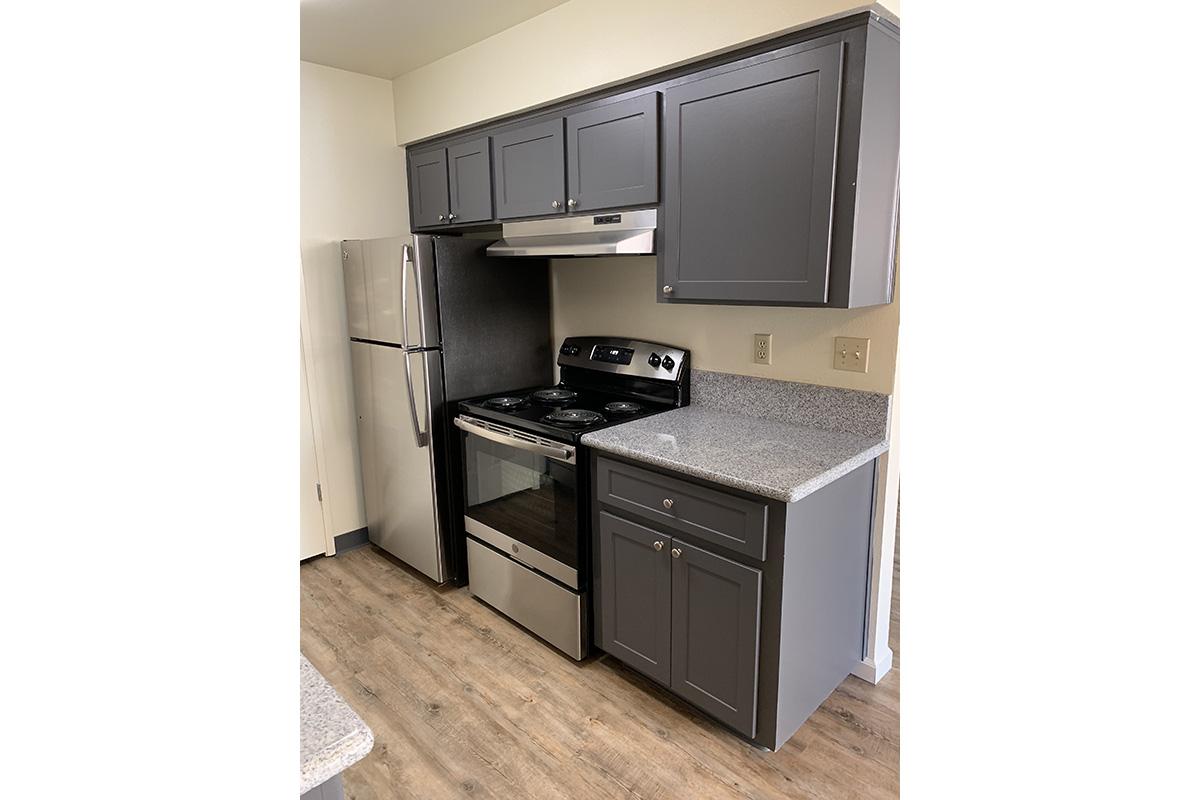 a stainless steel refrigerator in a kitchen