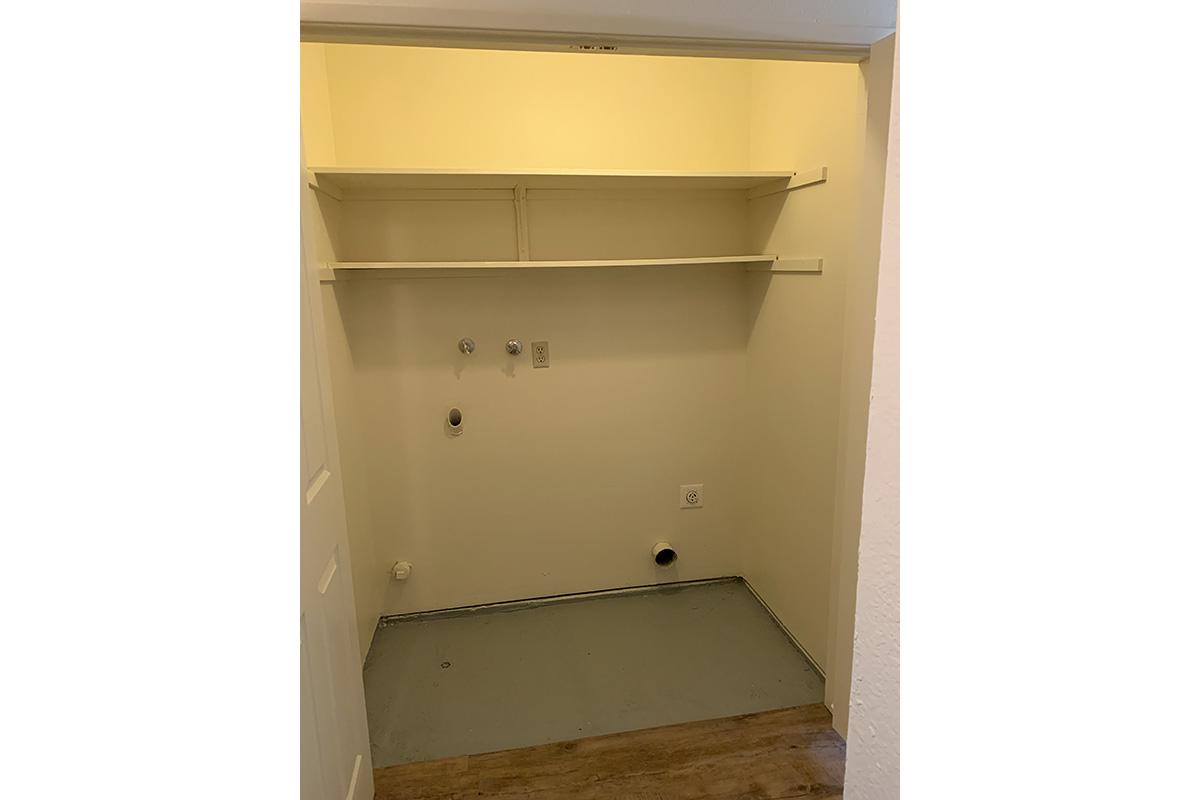 a white refrigerator freezer sitting in a room