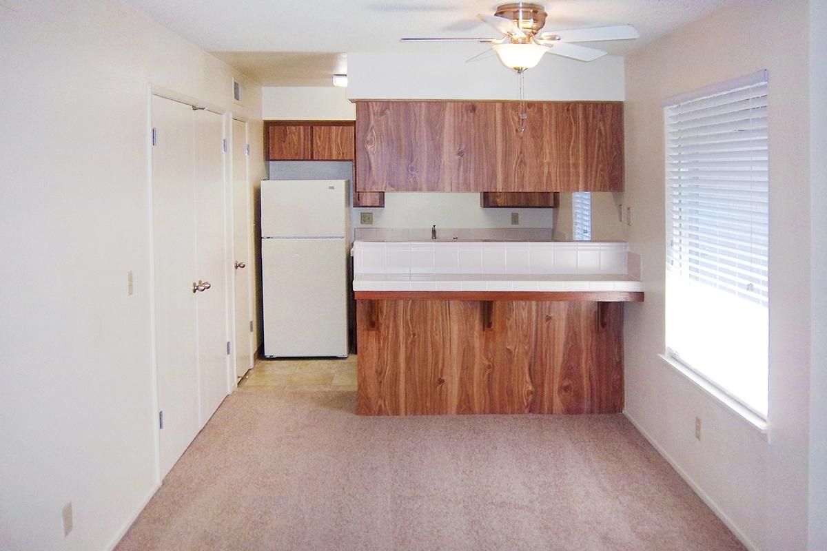 a kitchen with a wood floor