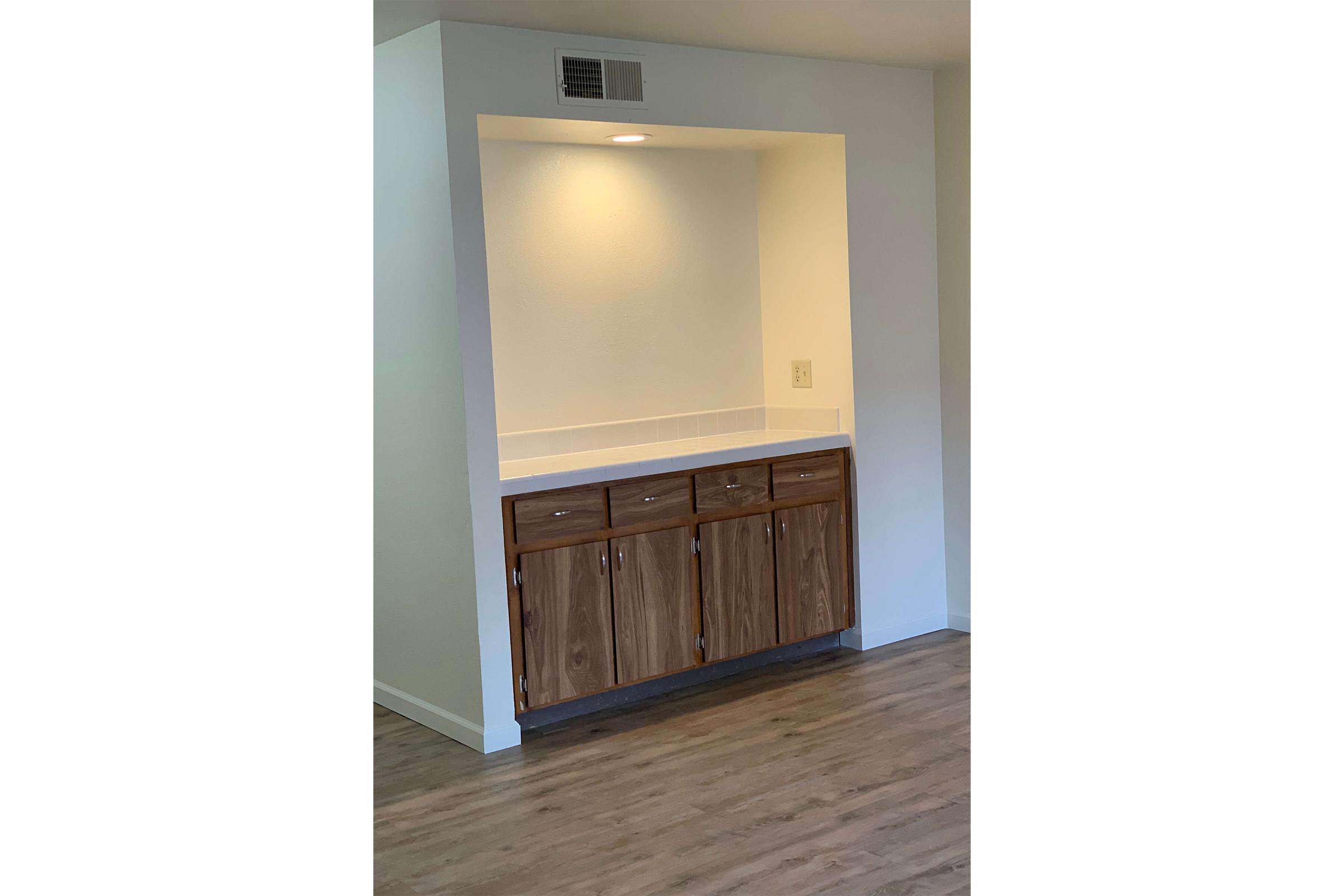 a white refrigerator freezer sitting in a room