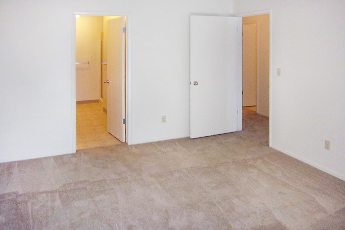 a white refrigerator freezer sitting inside of a building