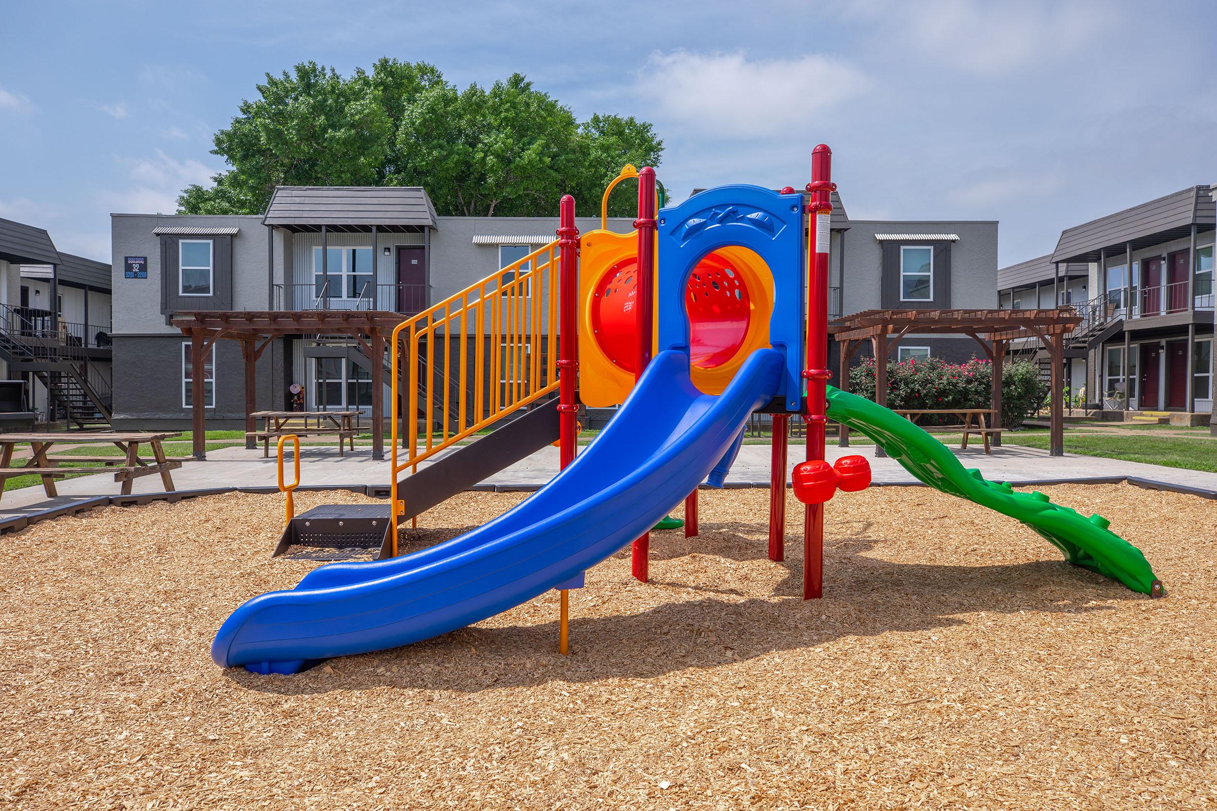 a playground in front of a building