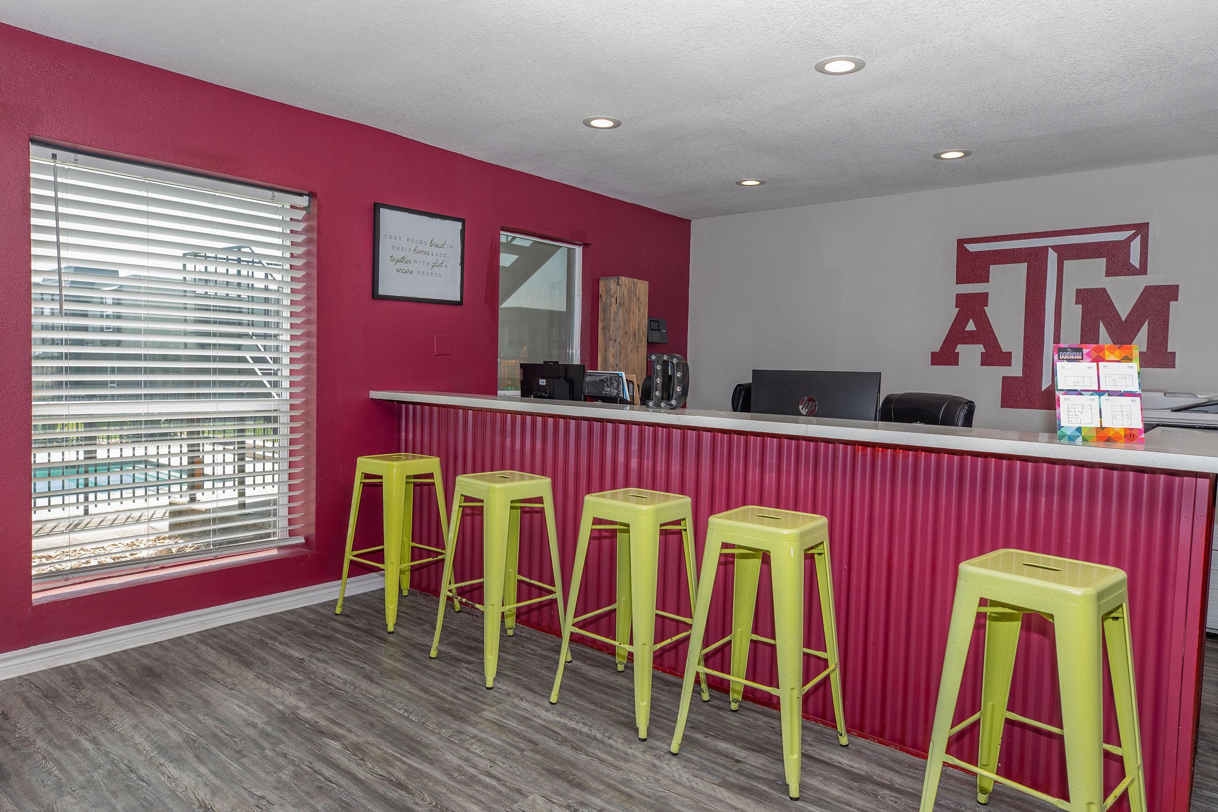 a room filled with furniture on top of a wooden chair