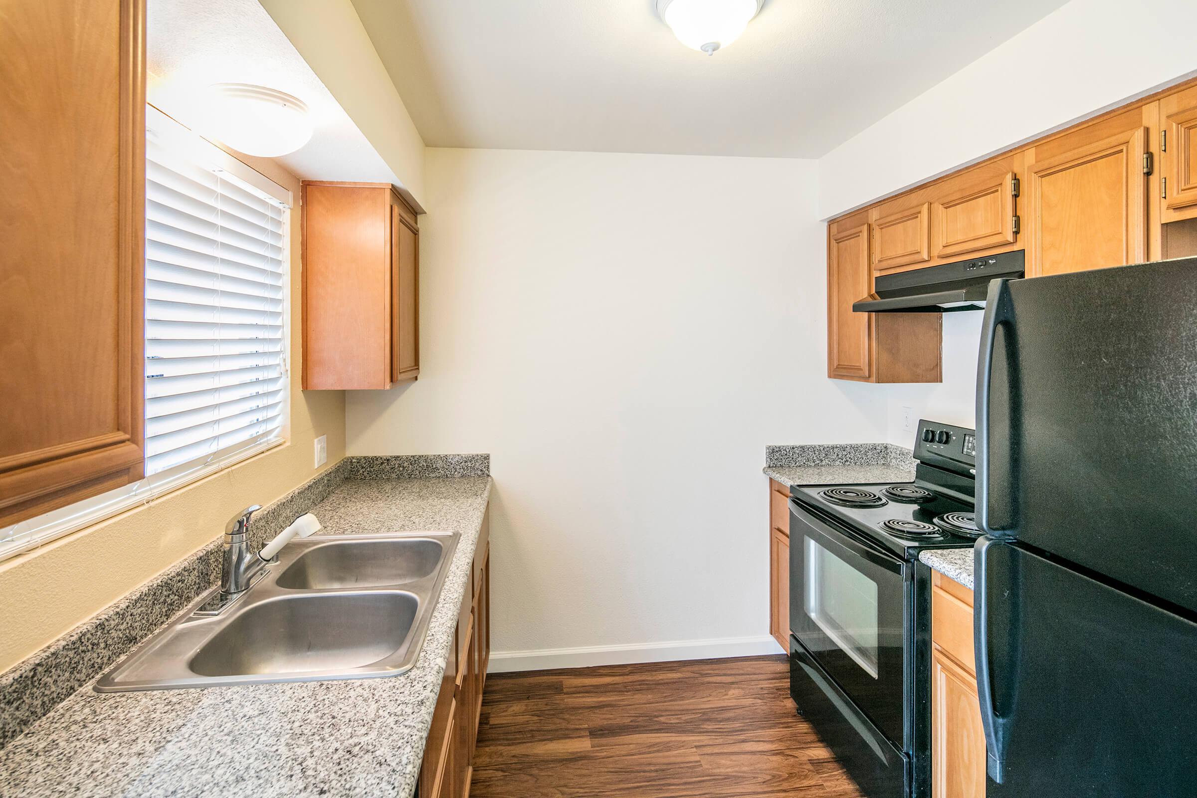 a modern kitchen with stainless steel appliances