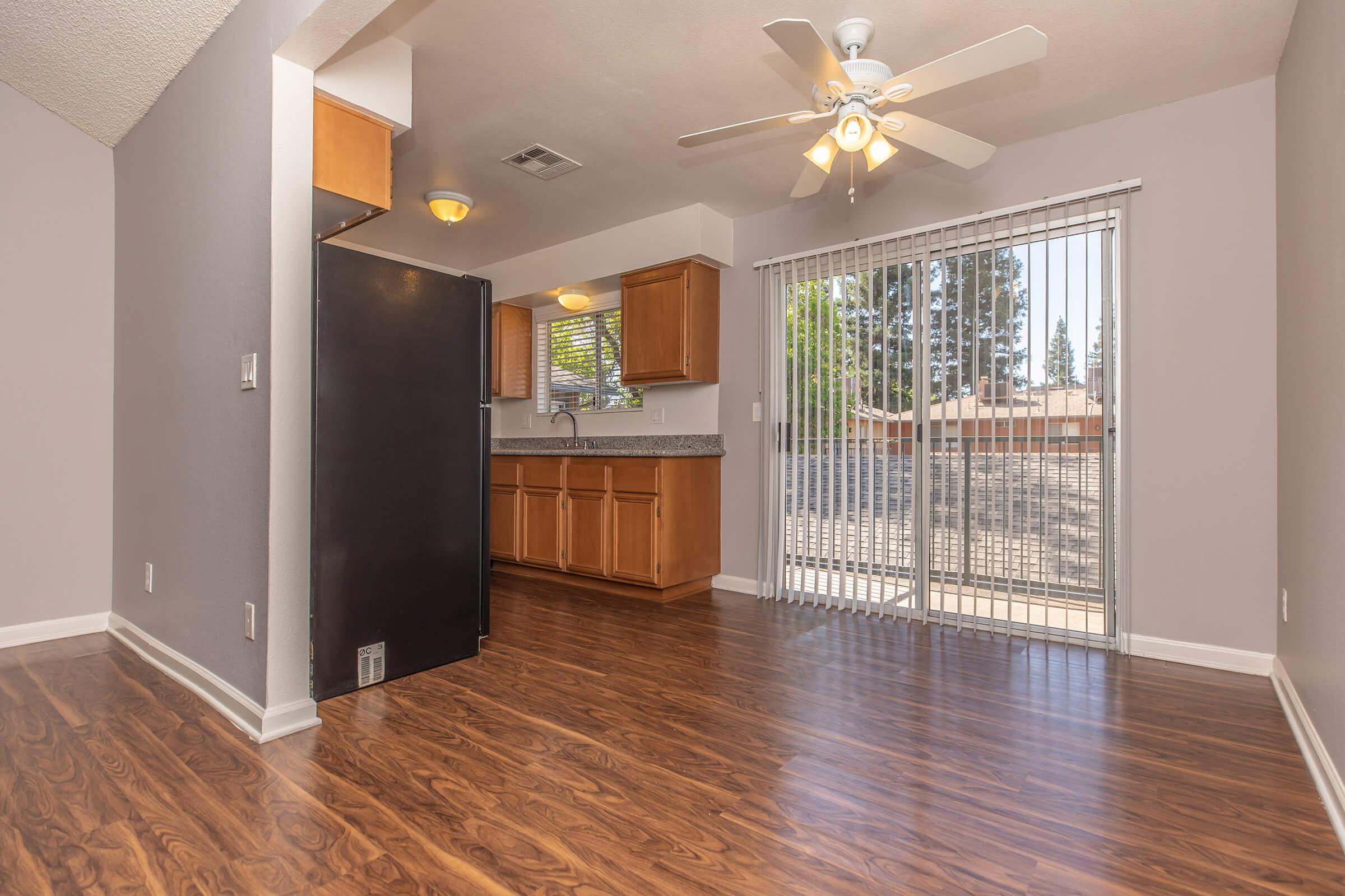 a view of a living room with a wood floor