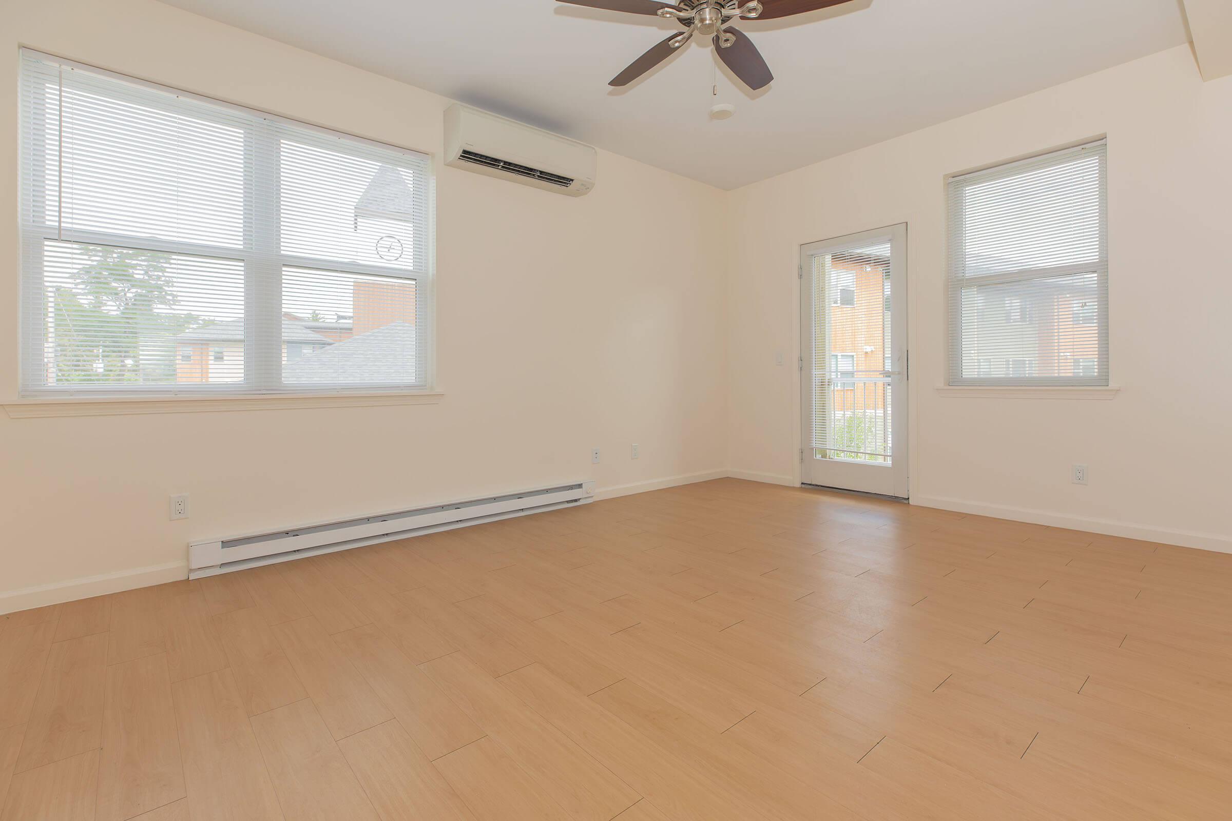 a living room next to a window