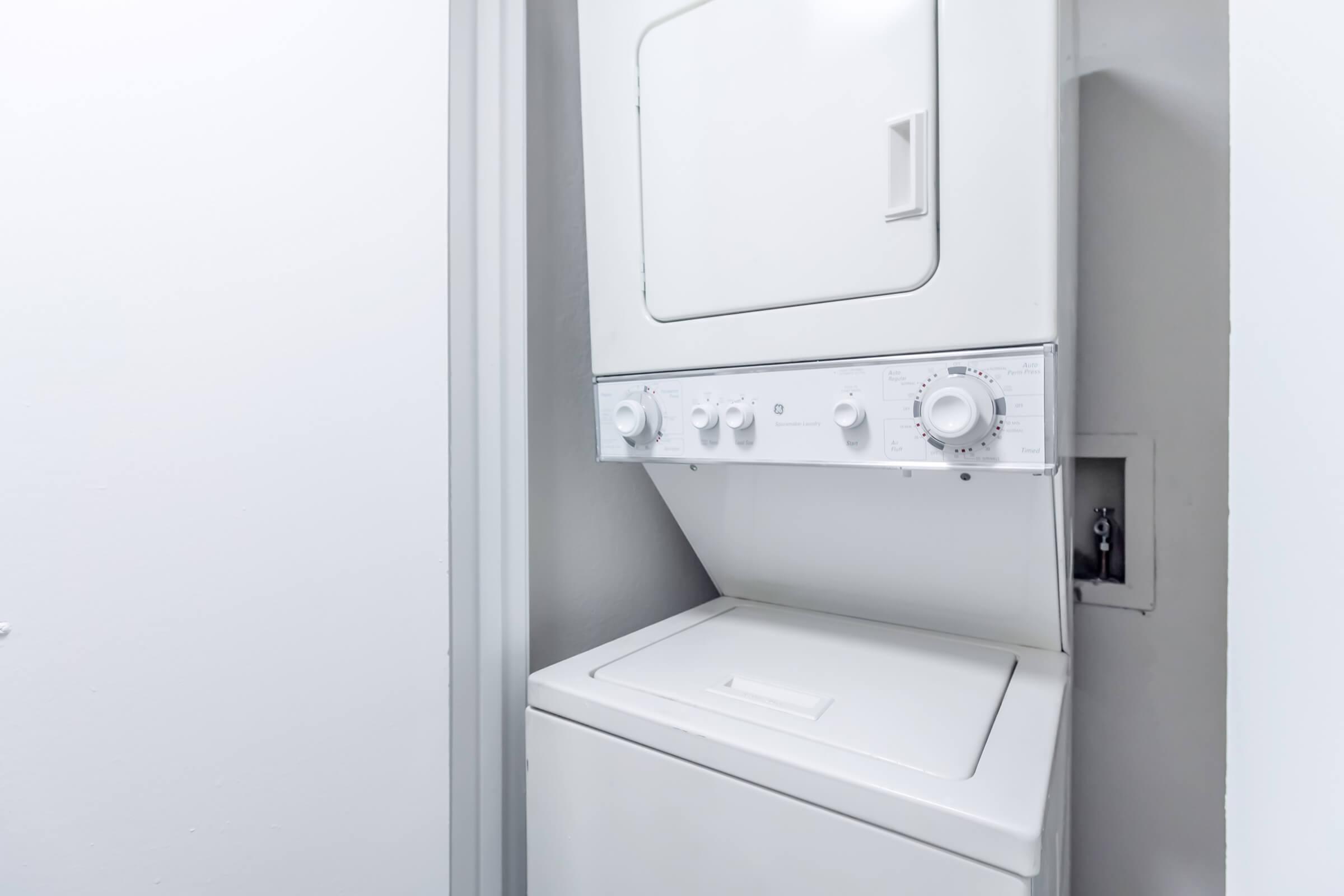 Closeup of a white washer/dryer combo