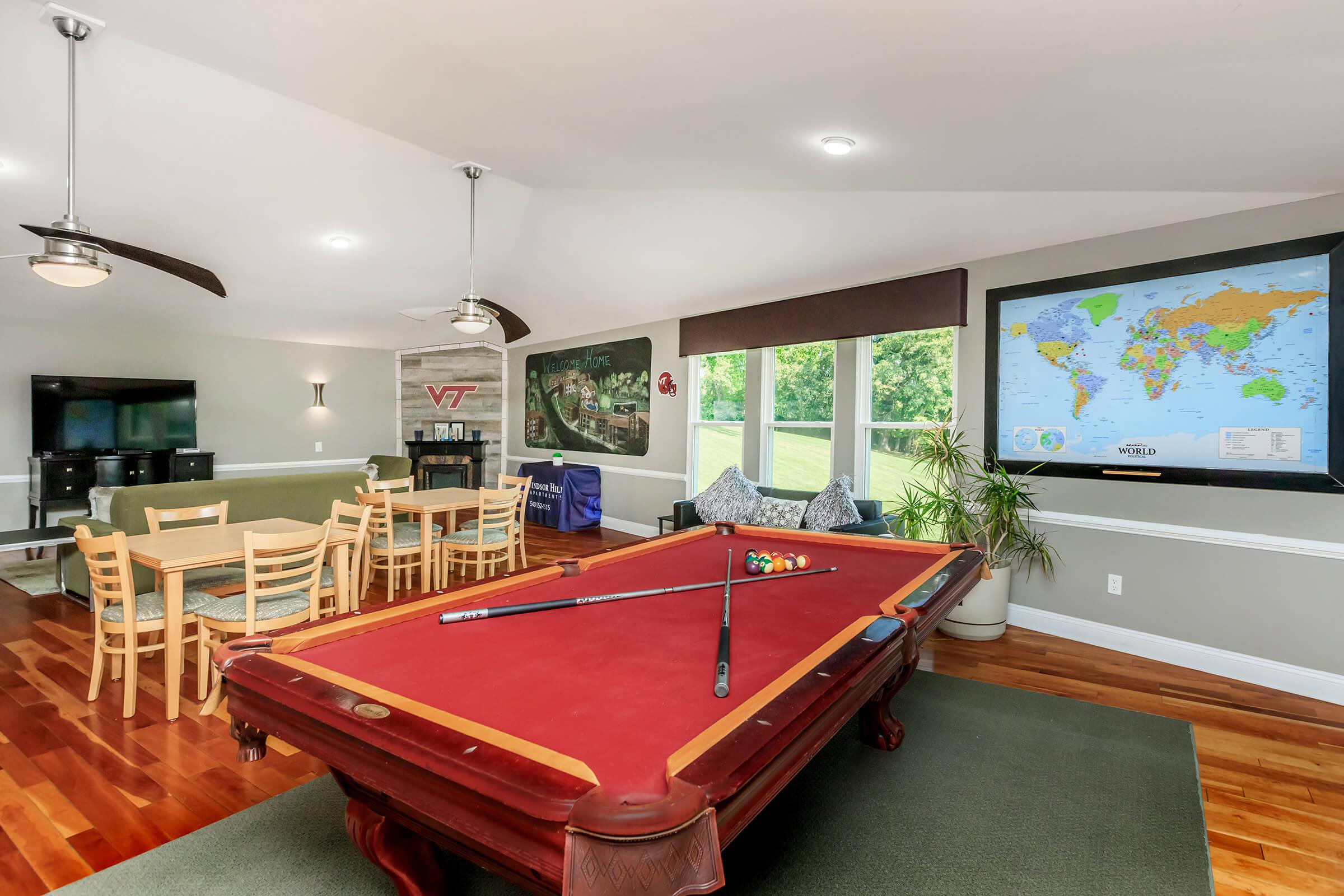 a screen shot of a living room with a wooden floor