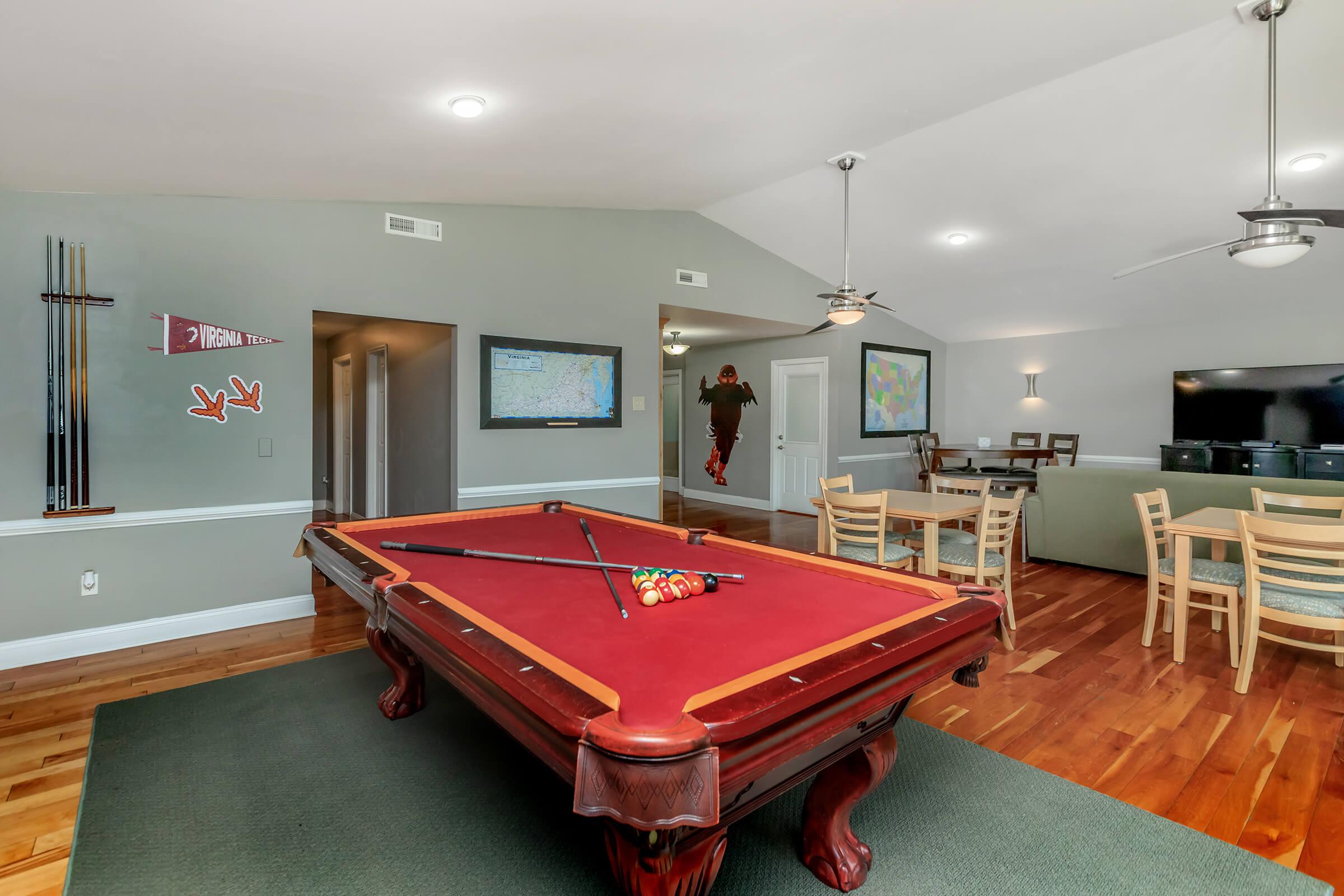 a screen shot of a living room with a wooden floor