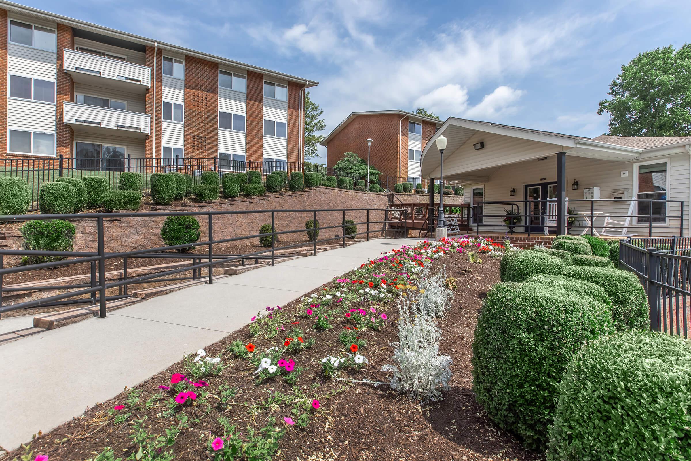 a garden in front of a building