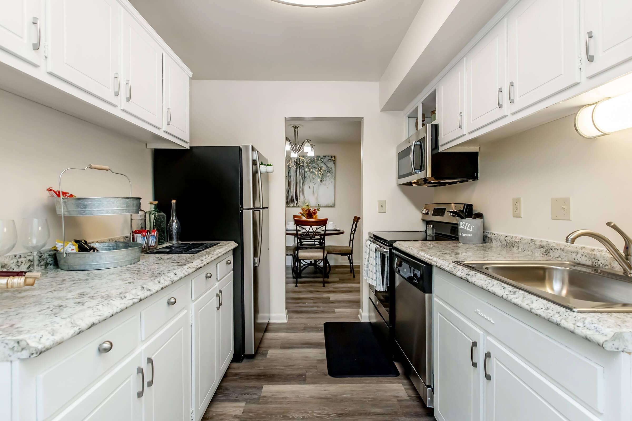 a kitchen with a sink and a counter