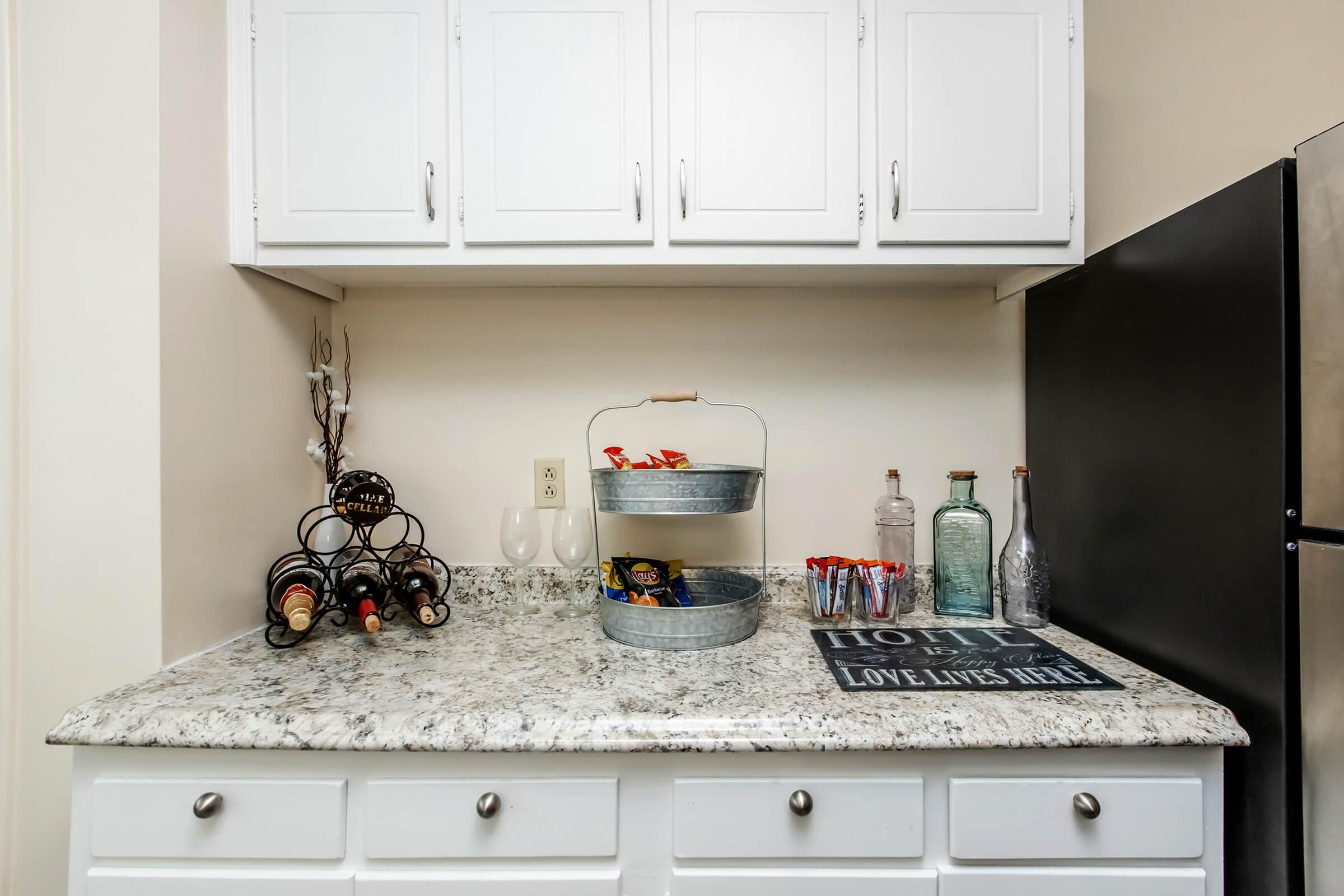 a kitchen with a sink and a microwave