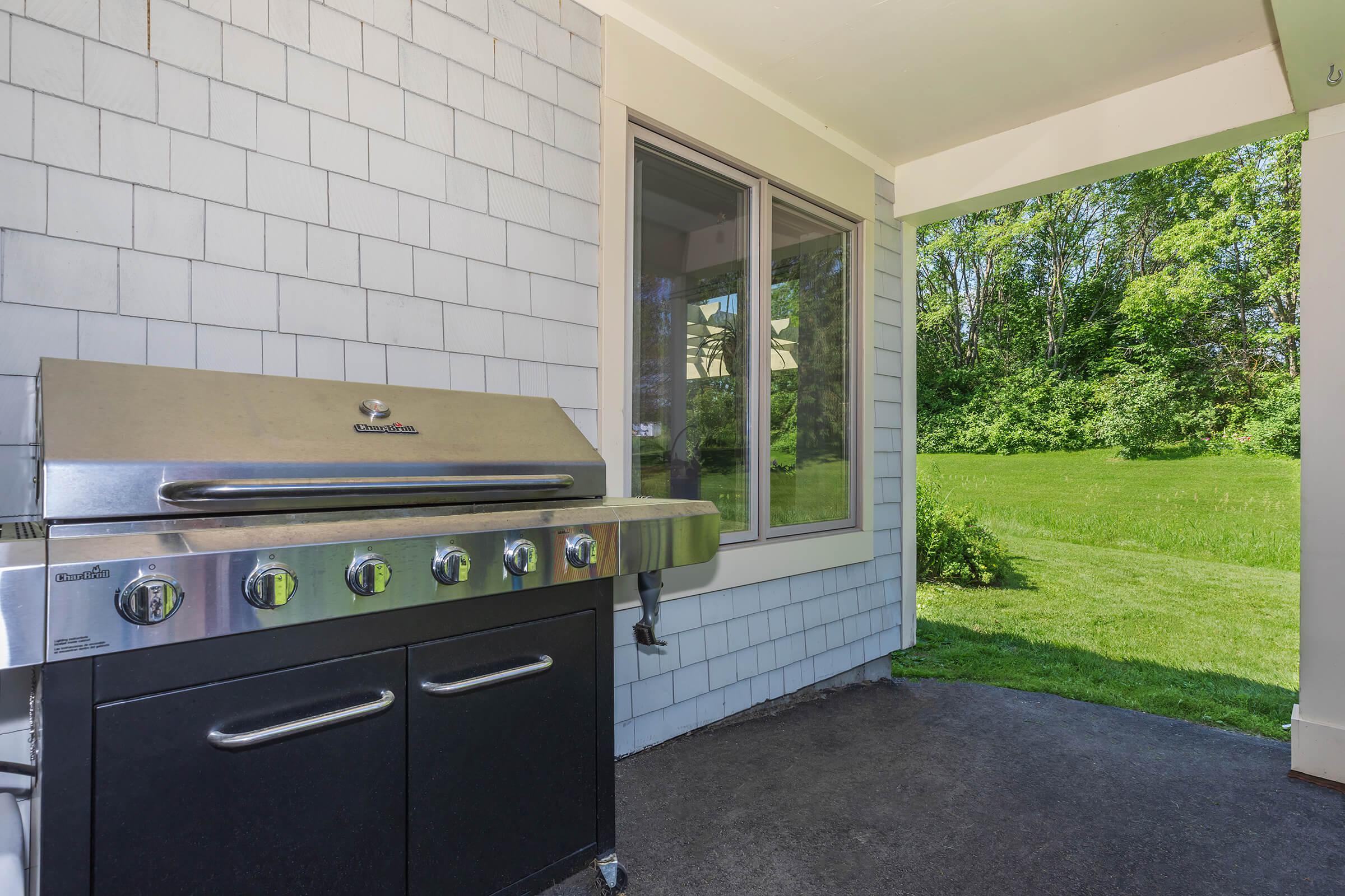 a stove top oven sitting inside of a room