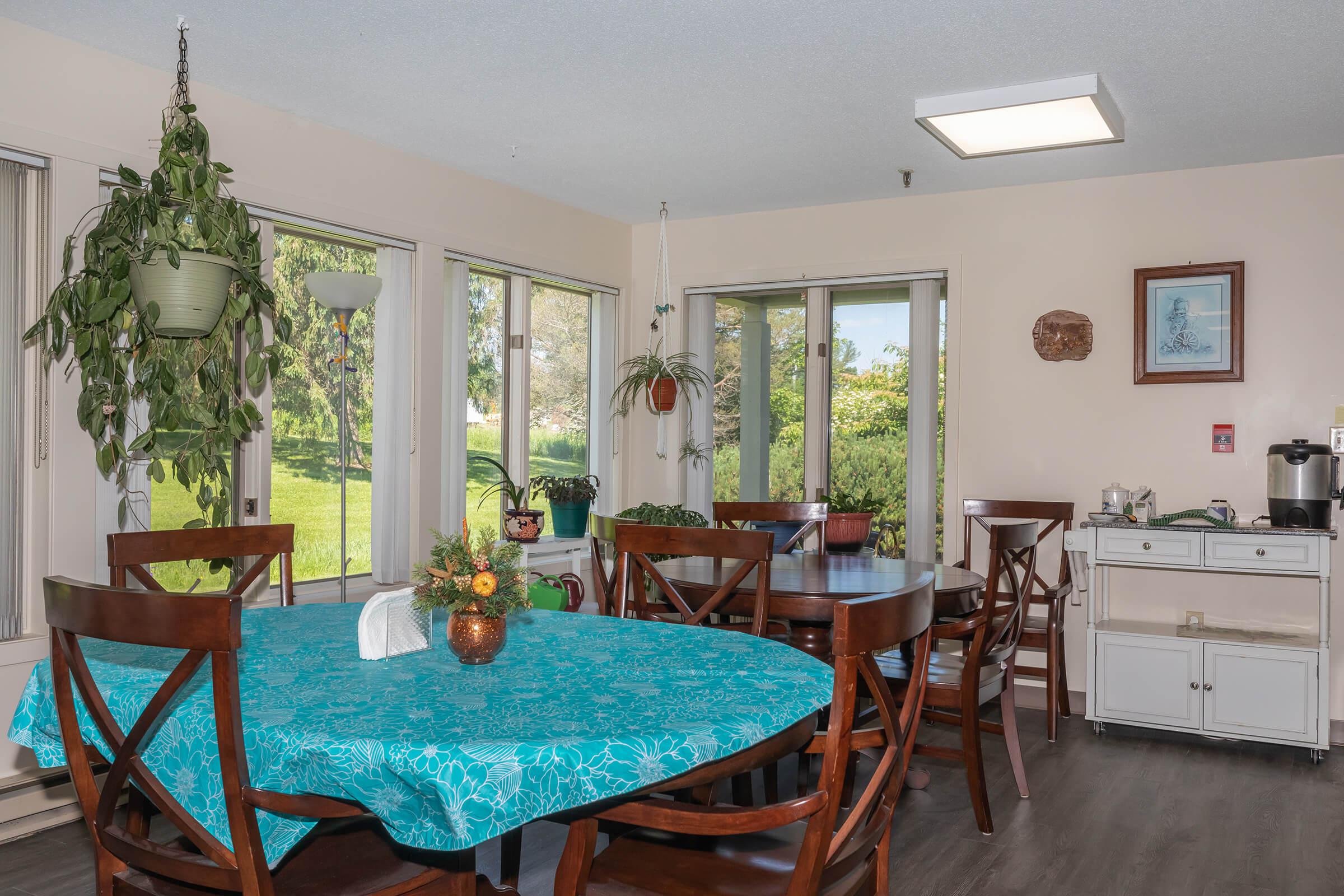 a living room filled with furniture and a table