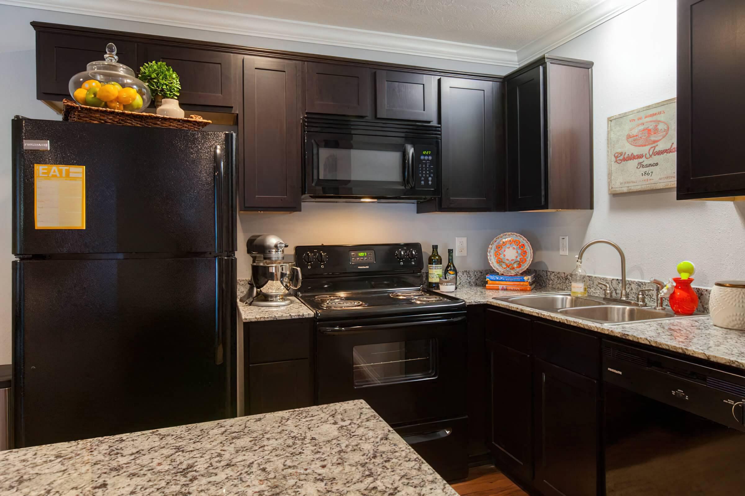 a modern kitchen with stainless steel appliances