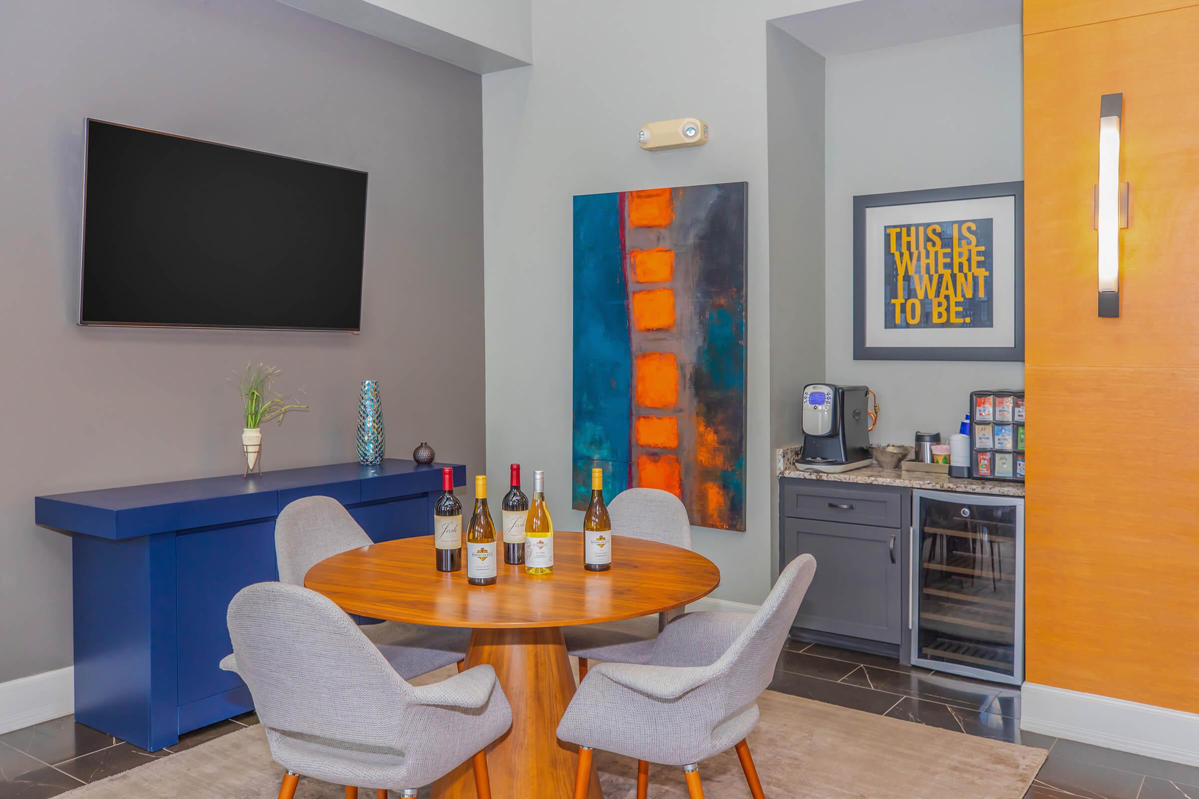 a kitchen with a table in a room