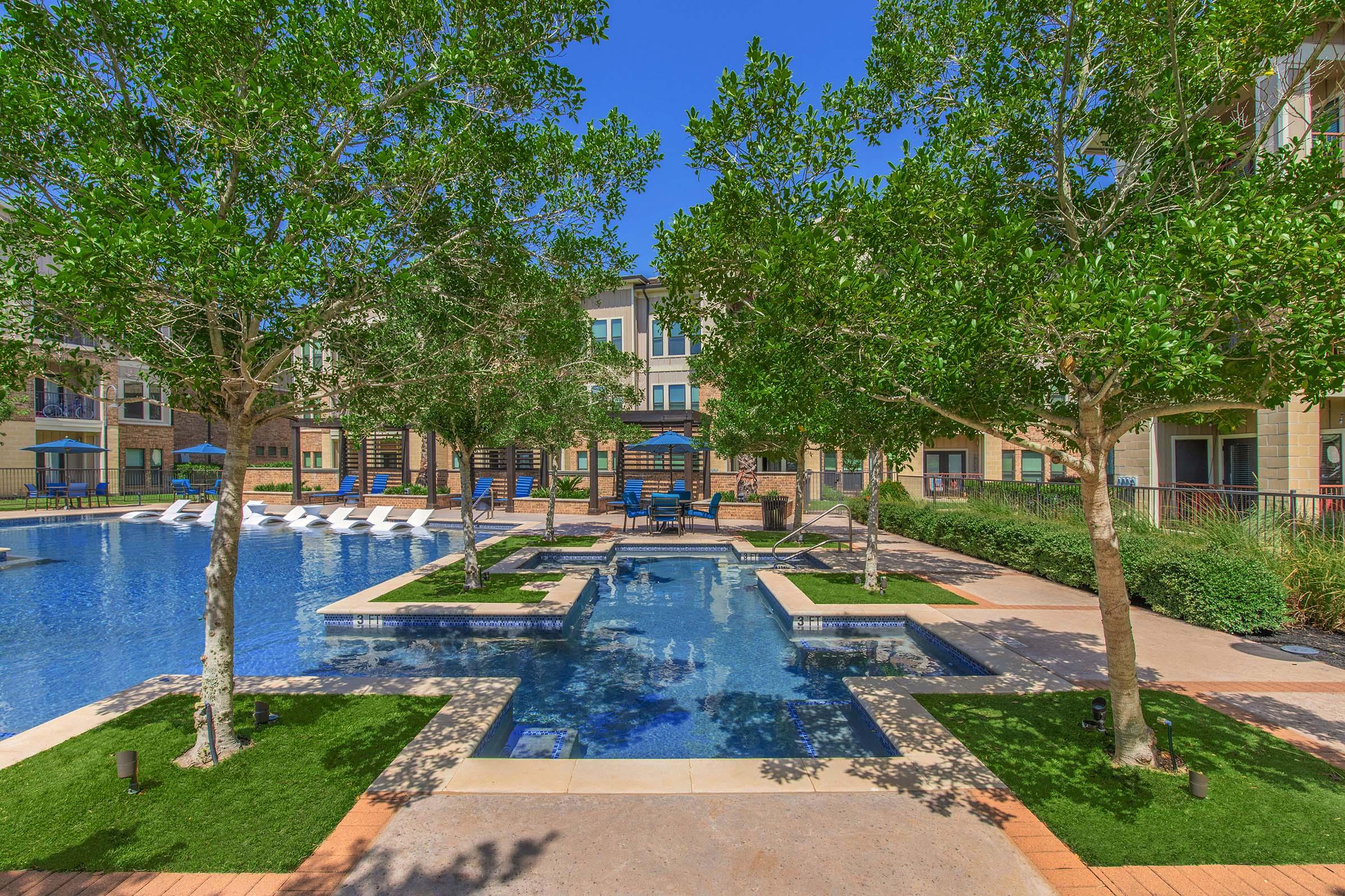 a pool next to a tree