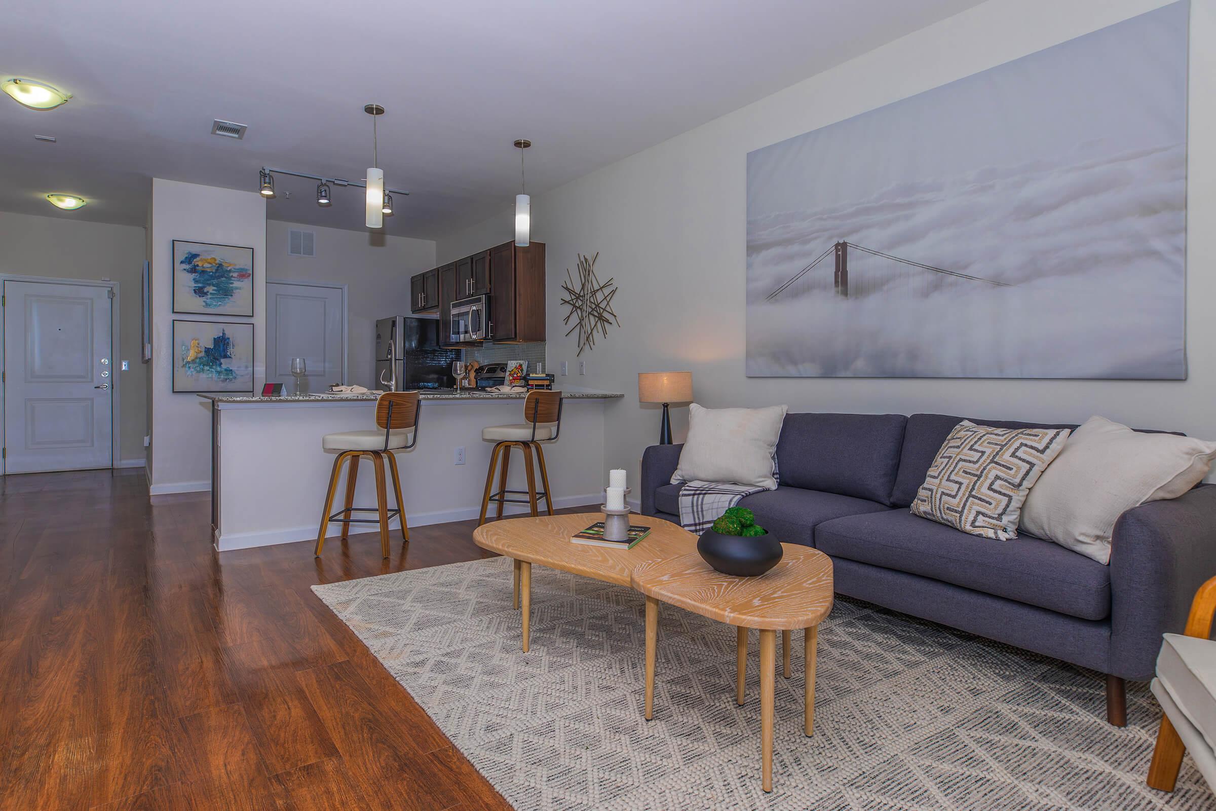 a living room with a wooden floor