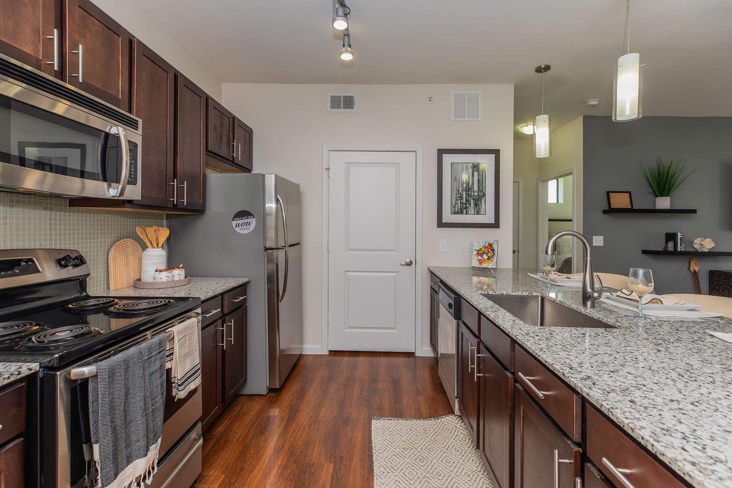 a modern kitchen with stainless steel appliances