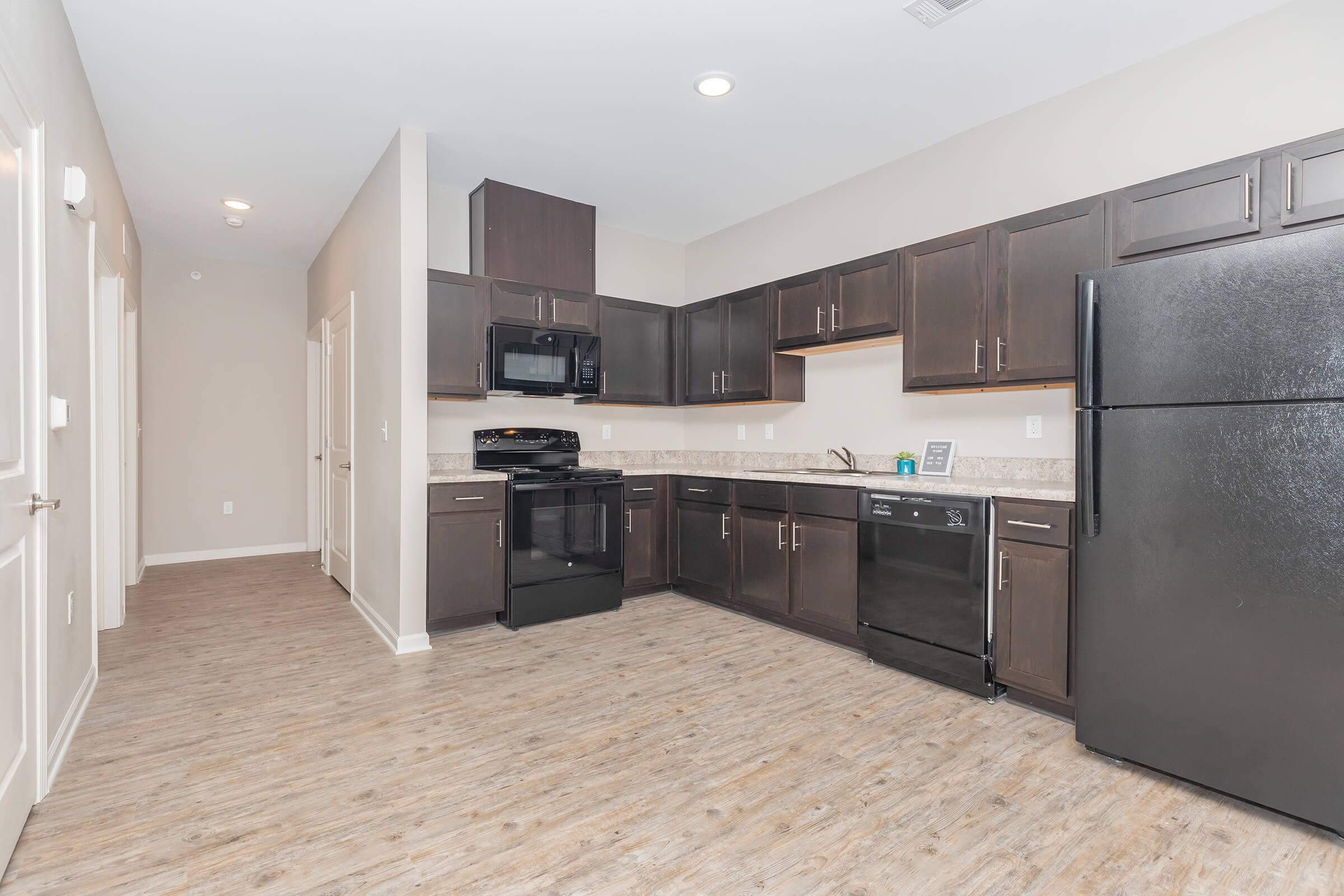 a stainless steel refrigerator in a kitchen