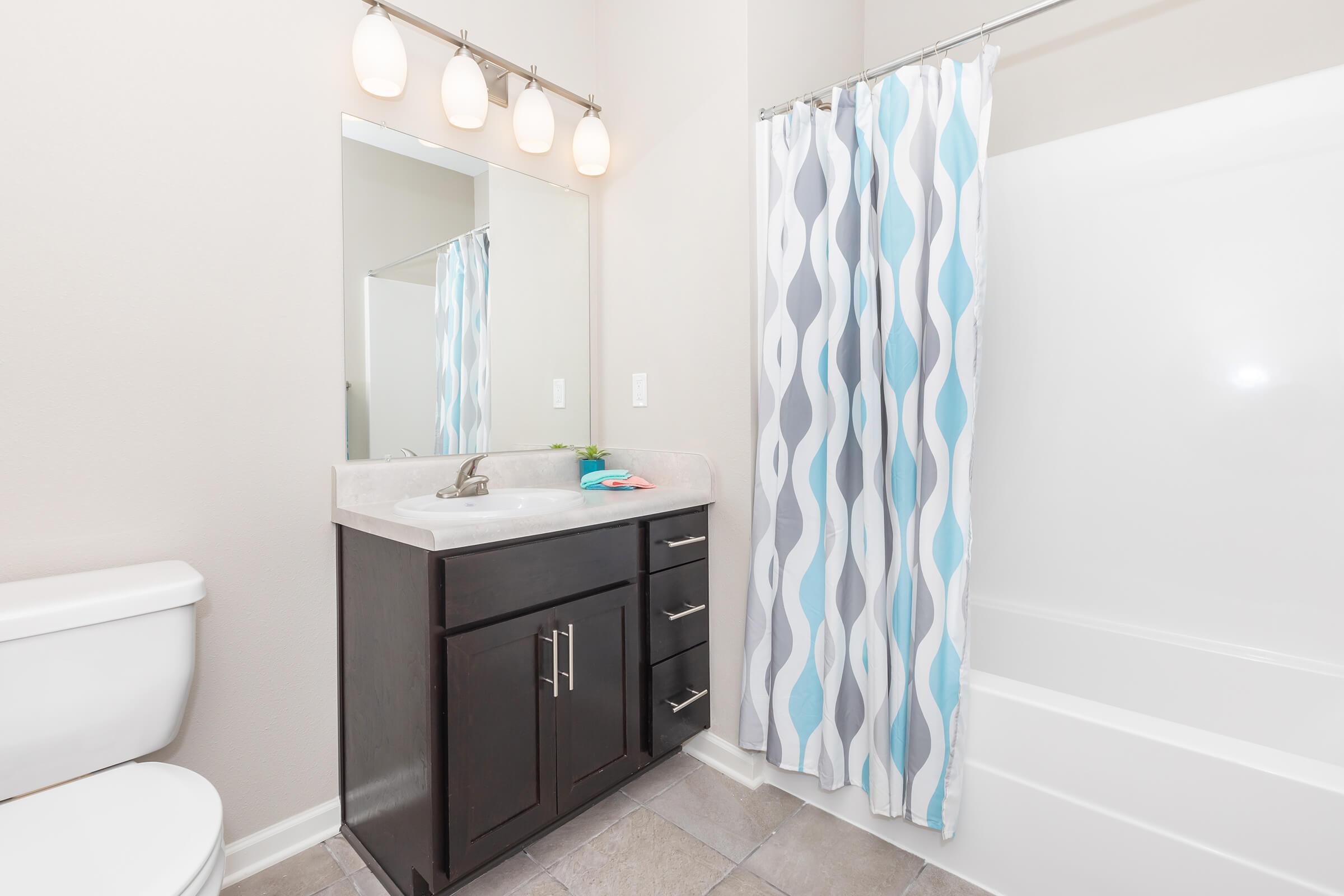 a brown and white shower curtain