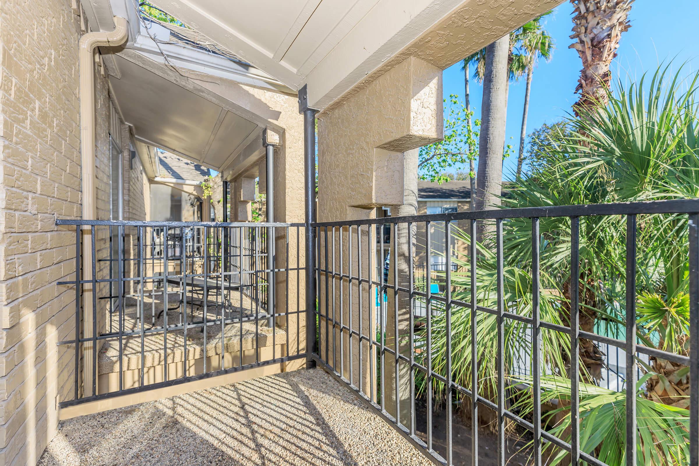 a building with a metal fence